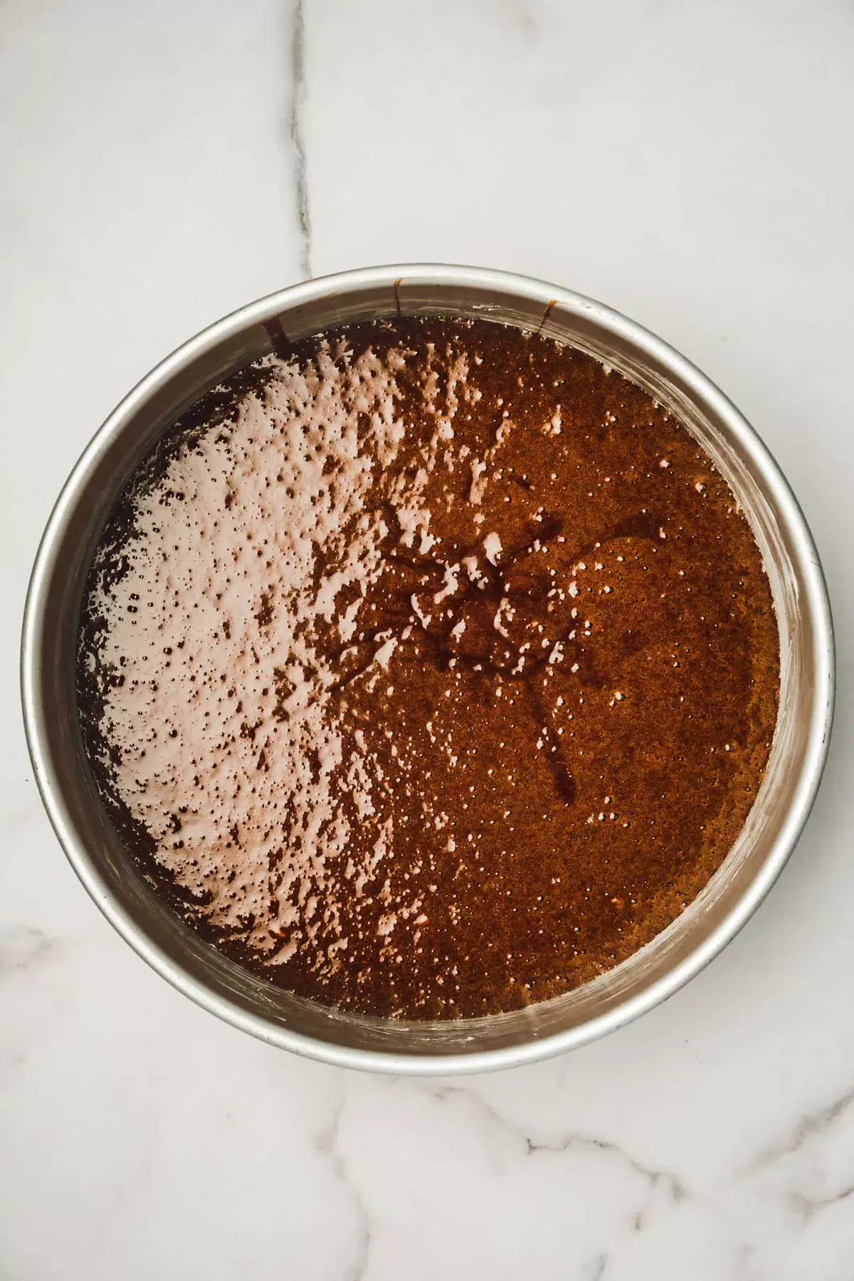 Sprinkform pan with chocolate fondant cake batter