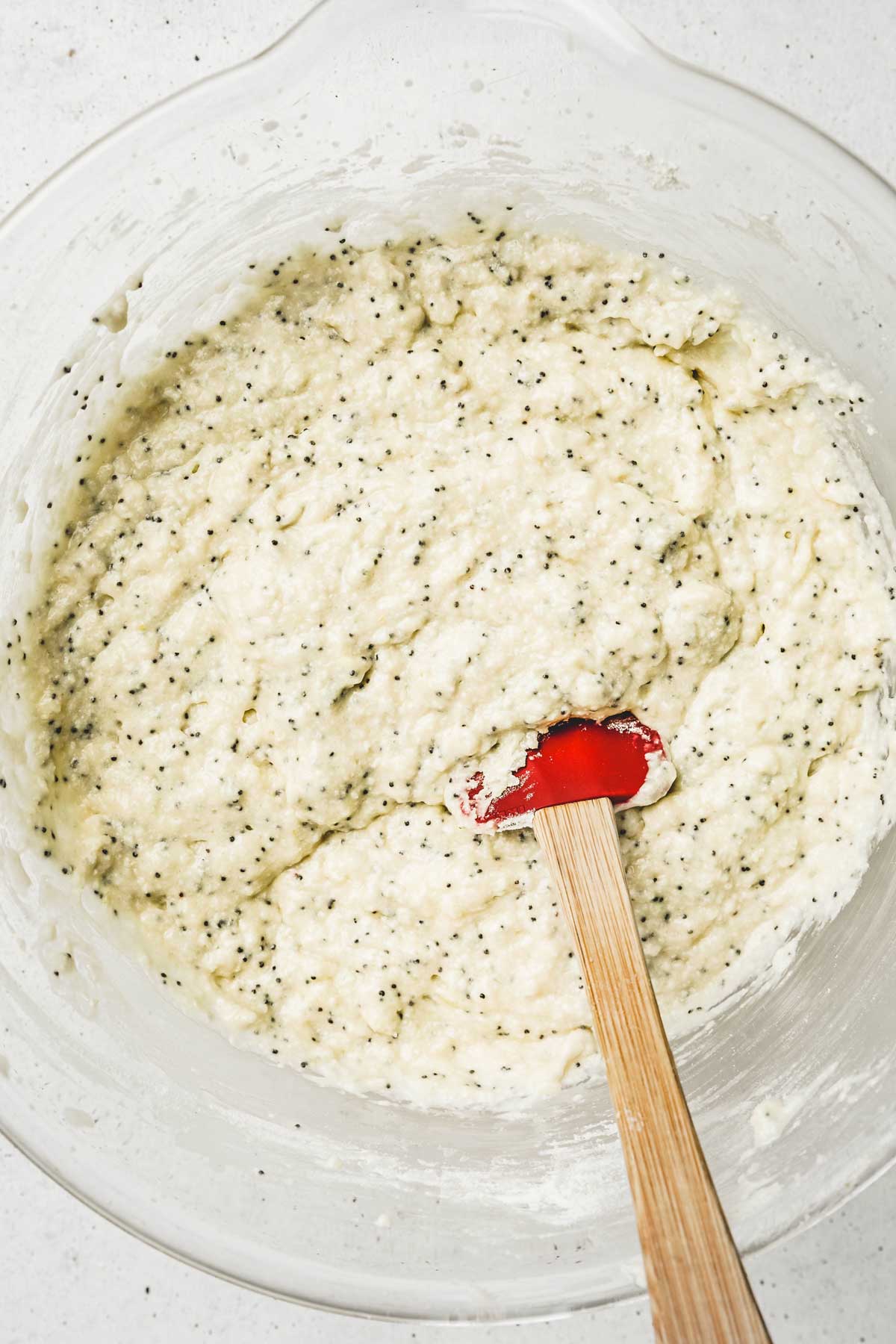 Preparation for lemon poppy seed cake in a large bowl