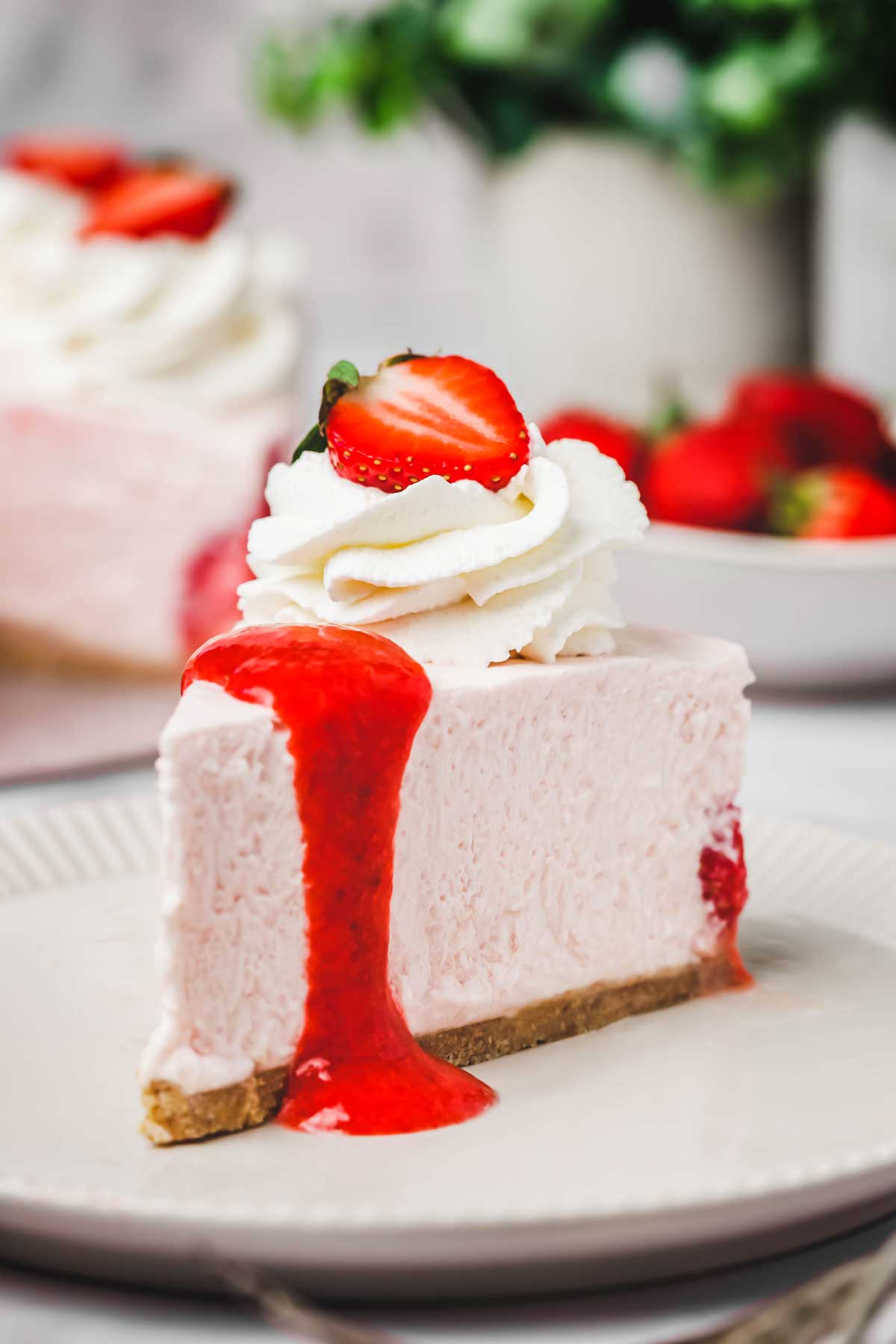 Piece of no-bake strawberry cheesecake on a plate