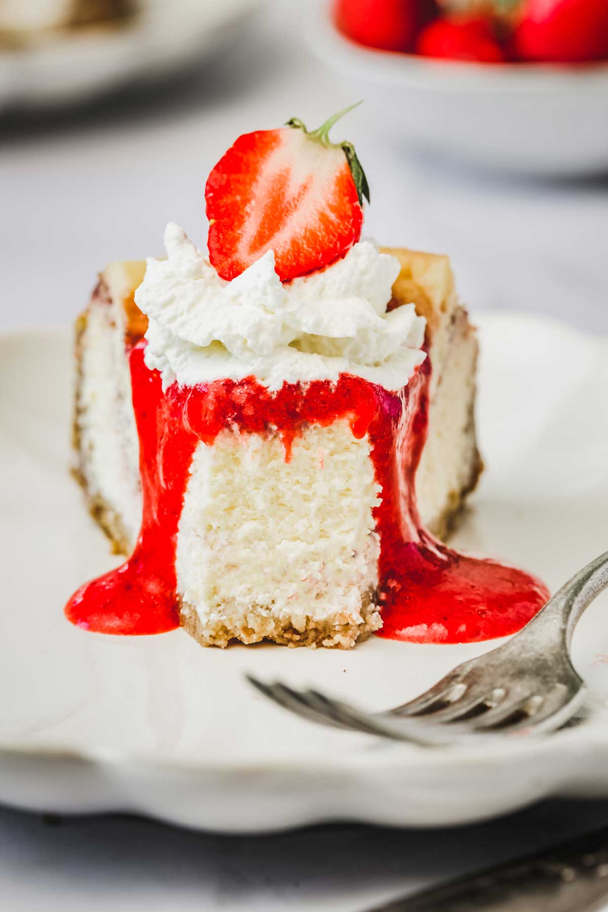 Strawberry cheesecake cut in a plate