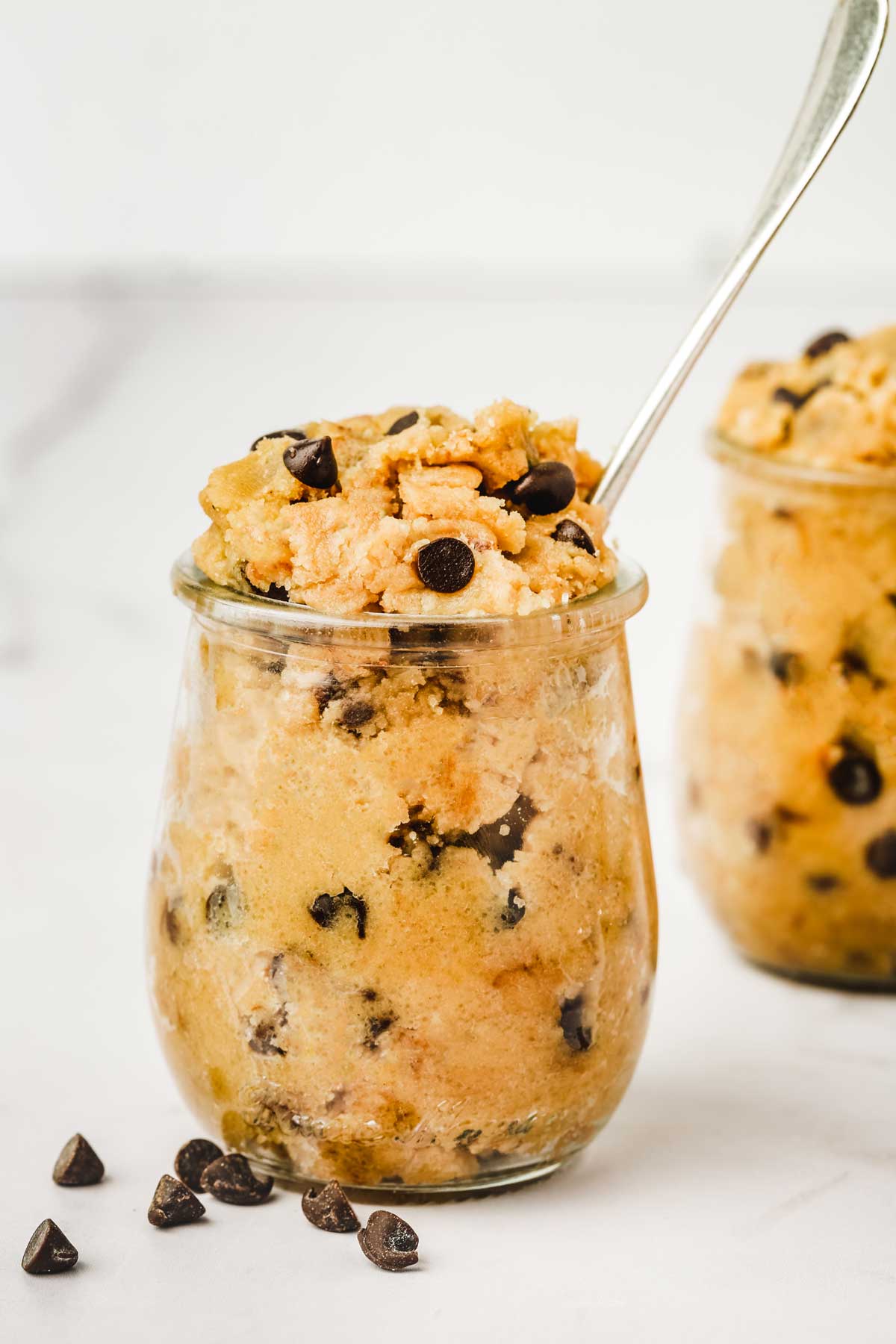 Small glass filled with cookie dough