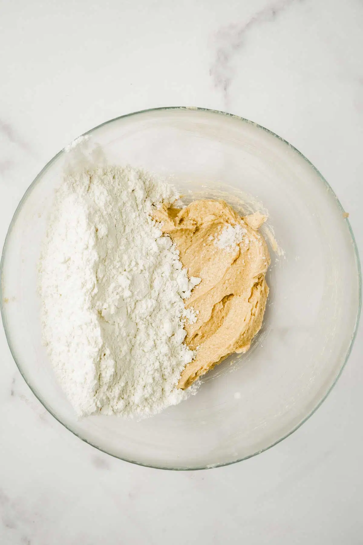 Large bowl with flour and cream butter