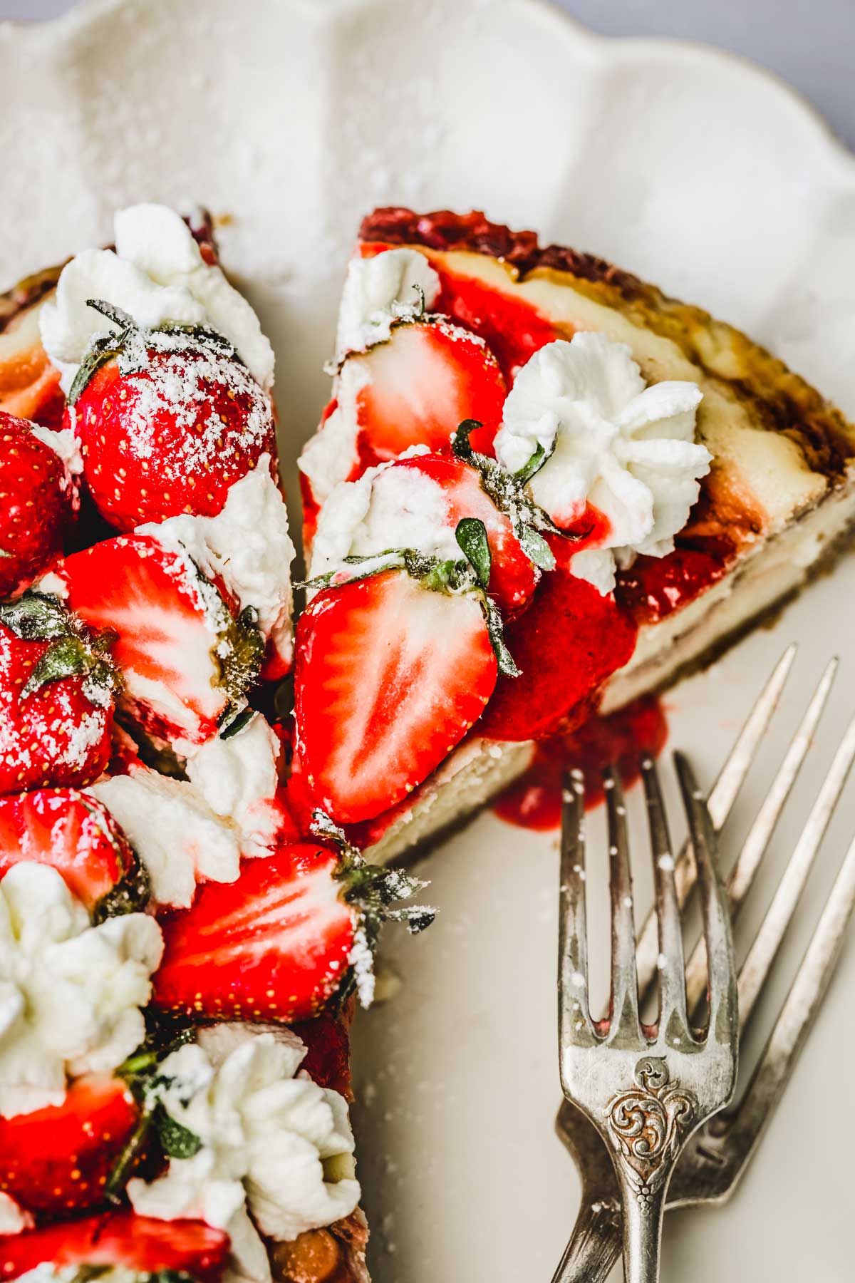 Strawberry cheesecake slices with forks
