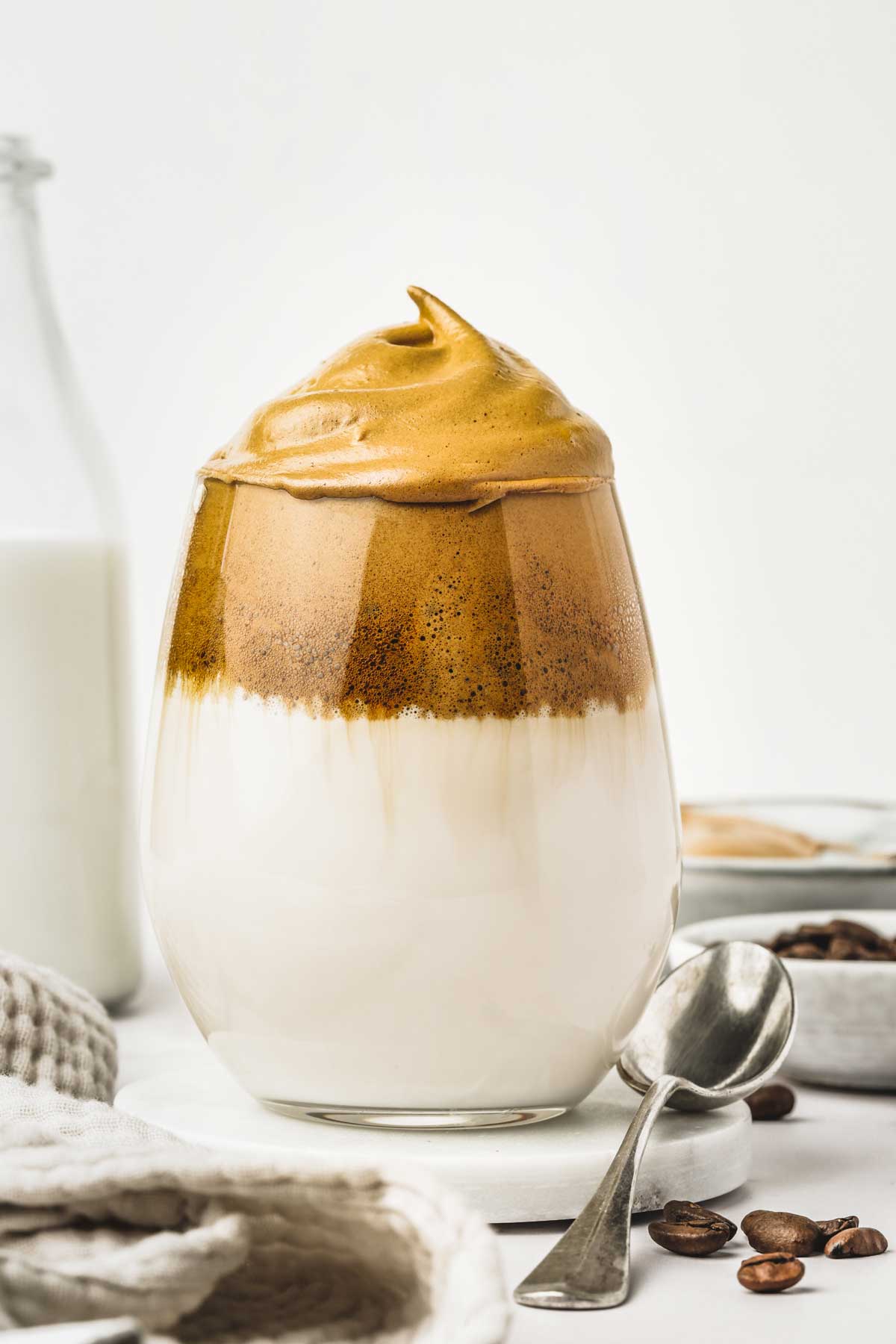 Glass with whipped coffee and milk