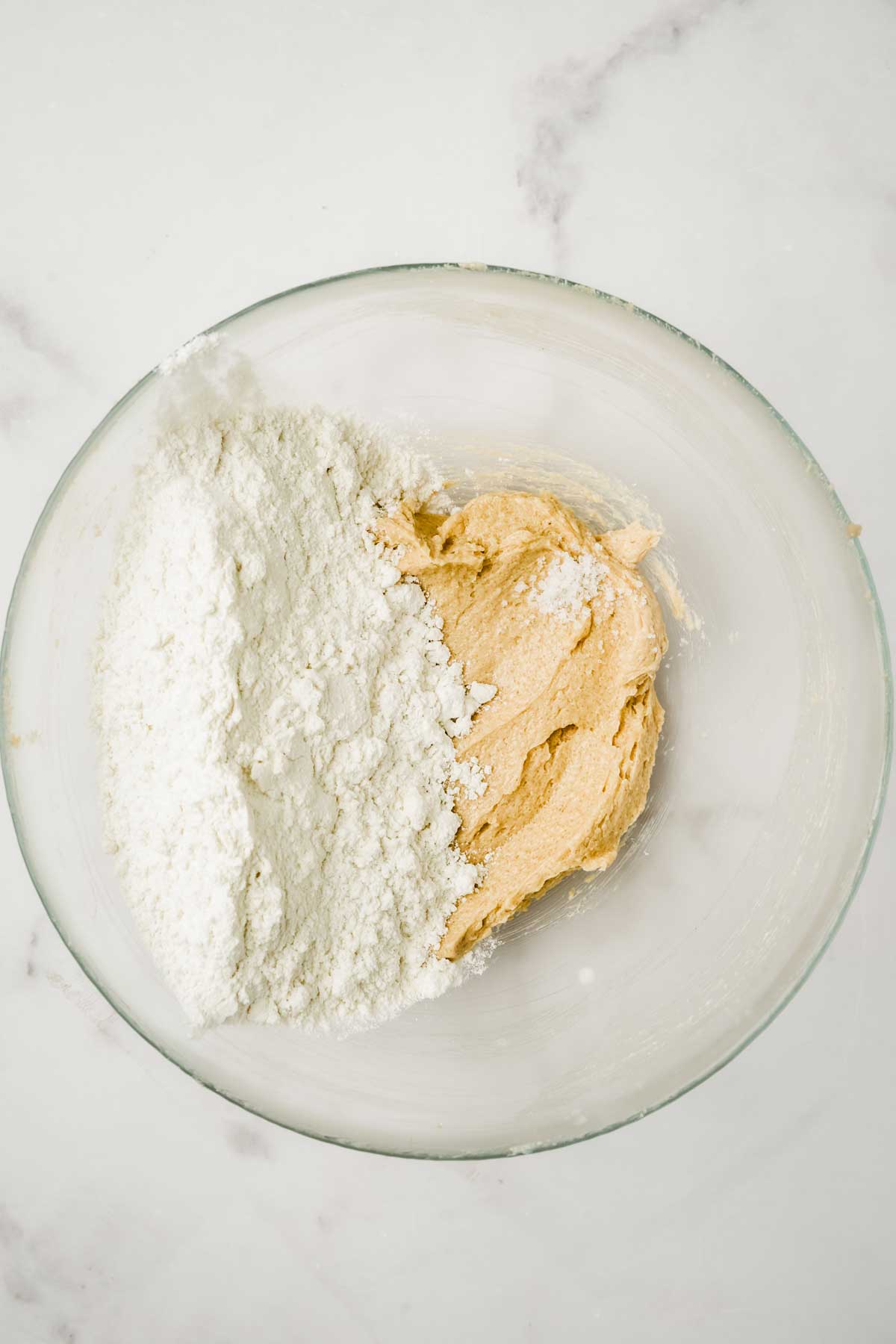 Large bowl with flour and cream butter