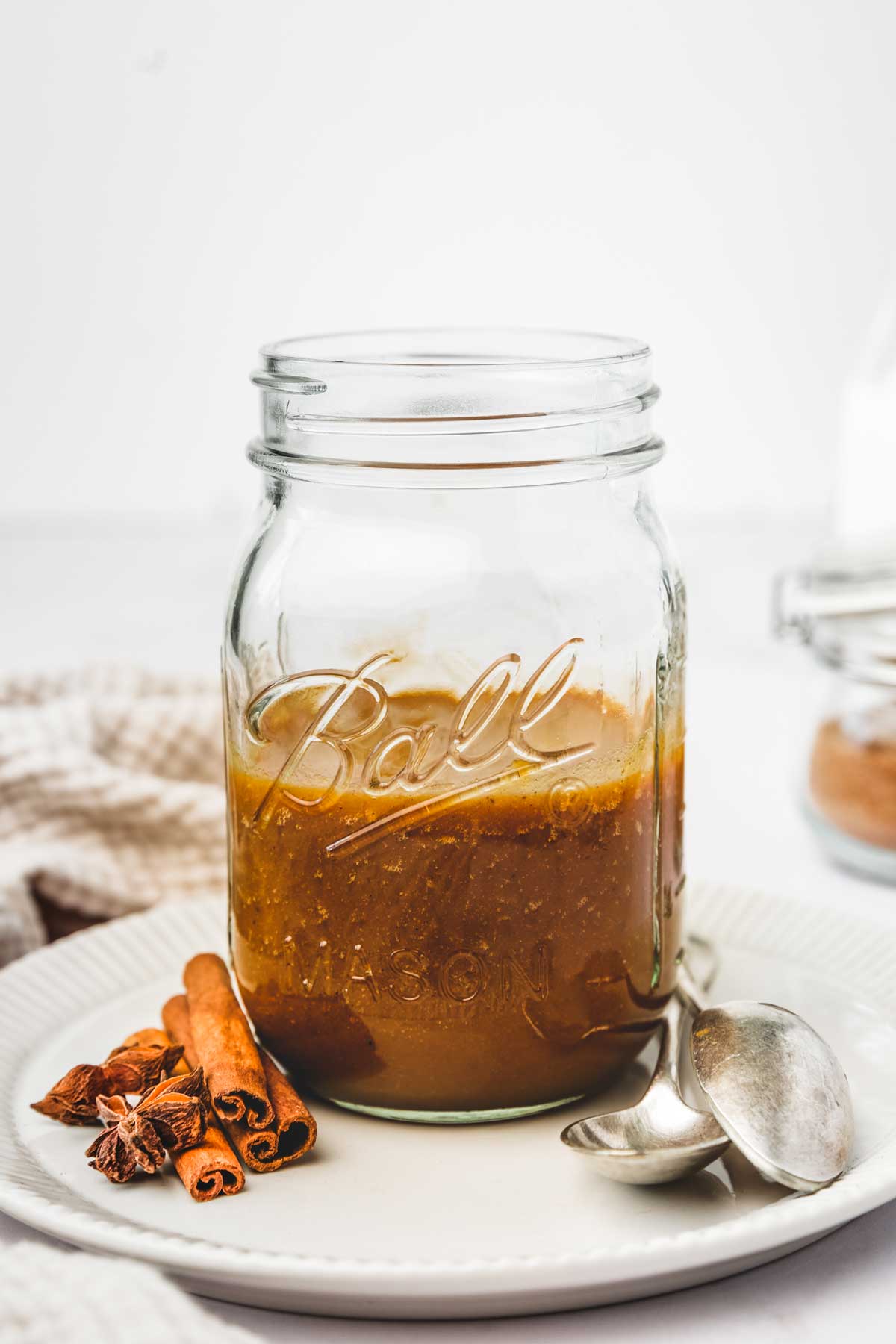 Jars with pumpkin spice sauce