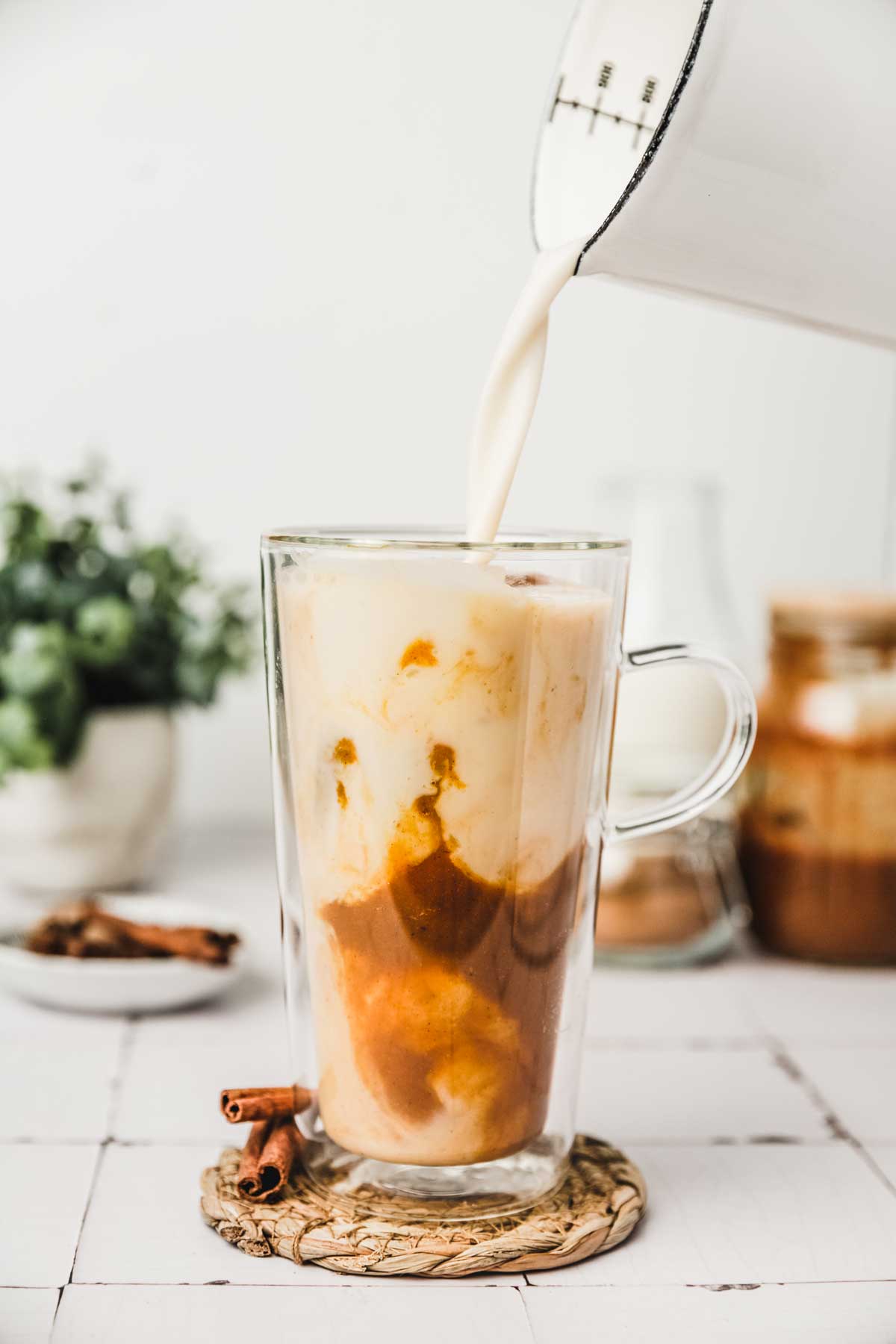 glass with iced pumpkin spice latte