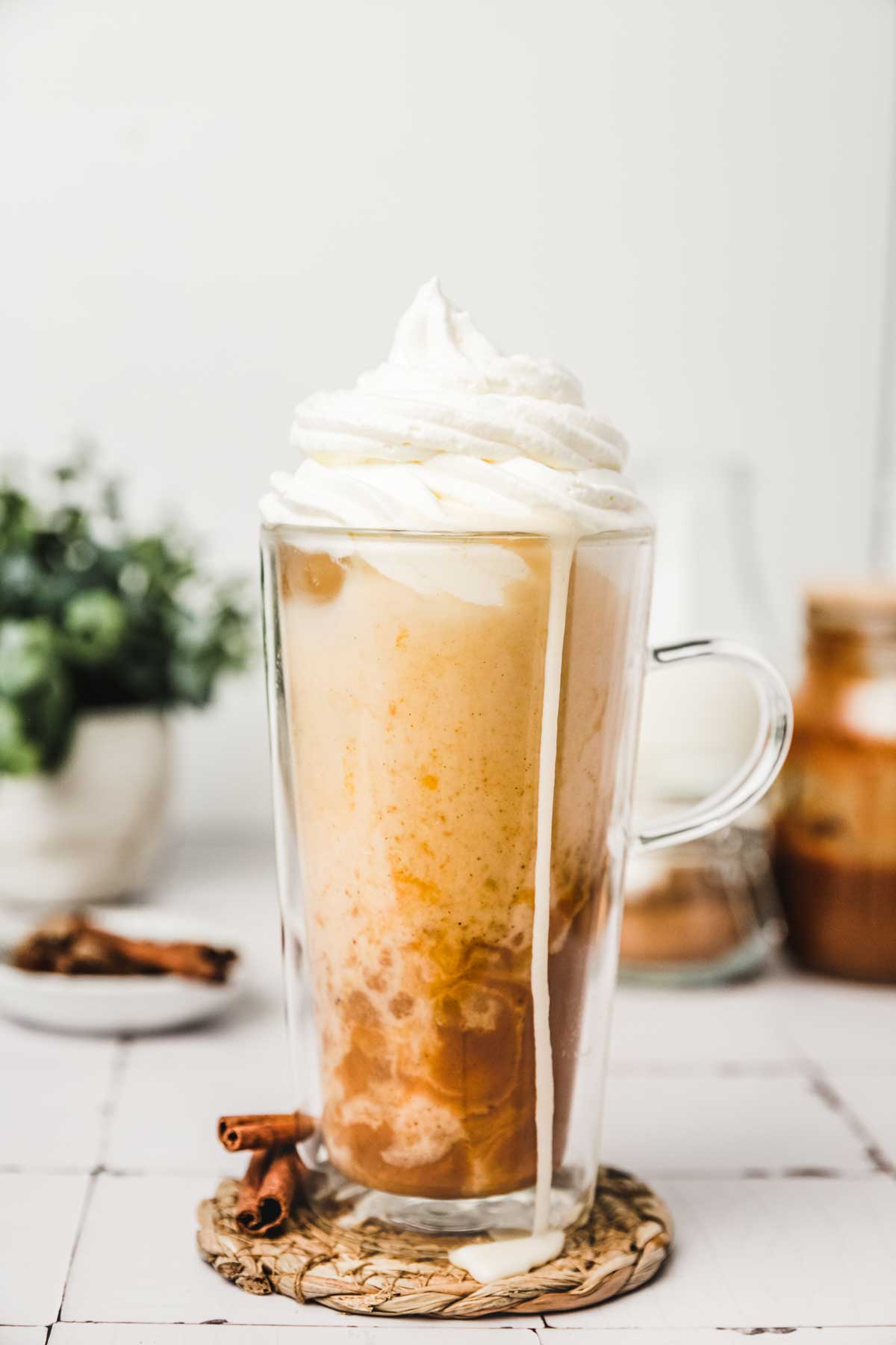 glass with pumpkin iced latte