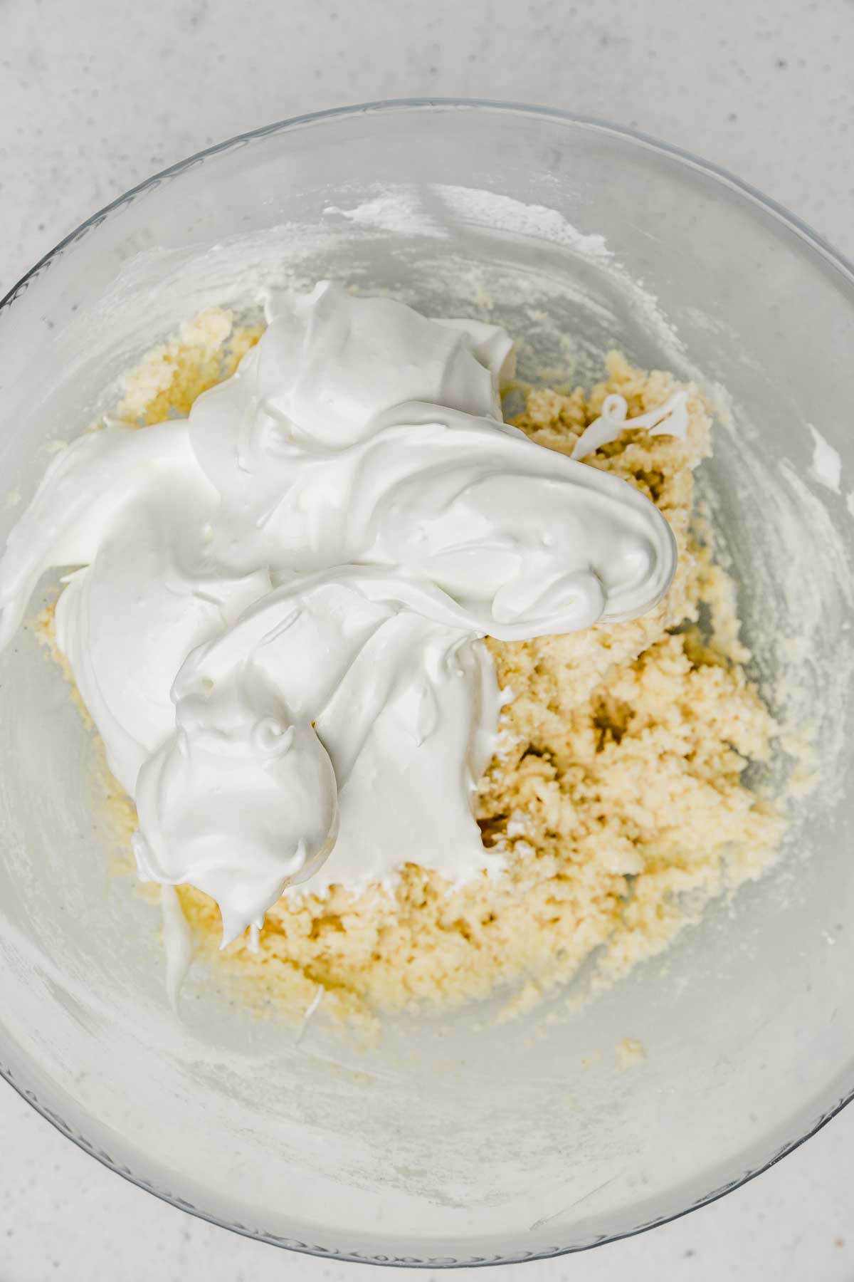 large bowl with meringue and dry ingredients
