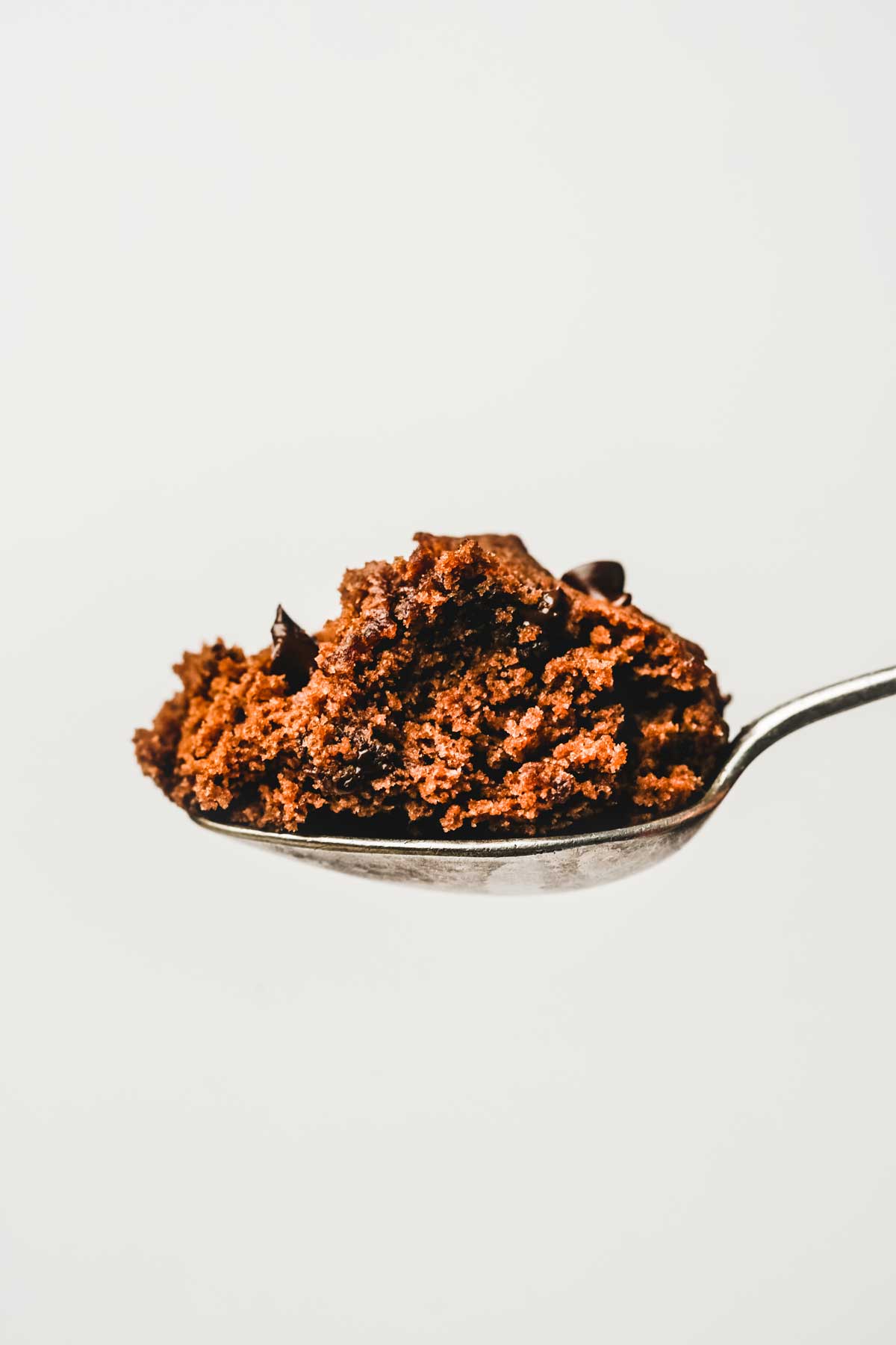 Spoonful of hot cocoa mug cake close up