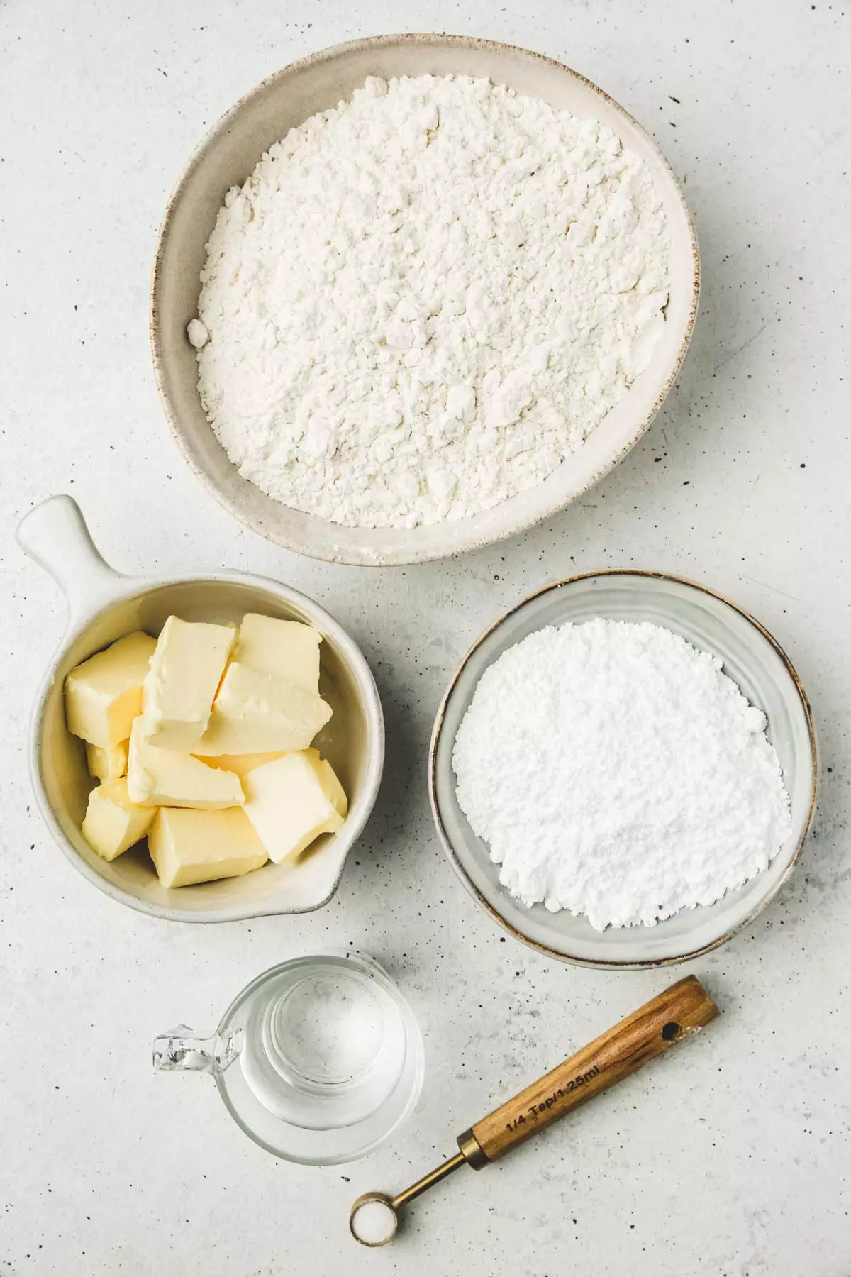Bowls with ingredients in a work surface