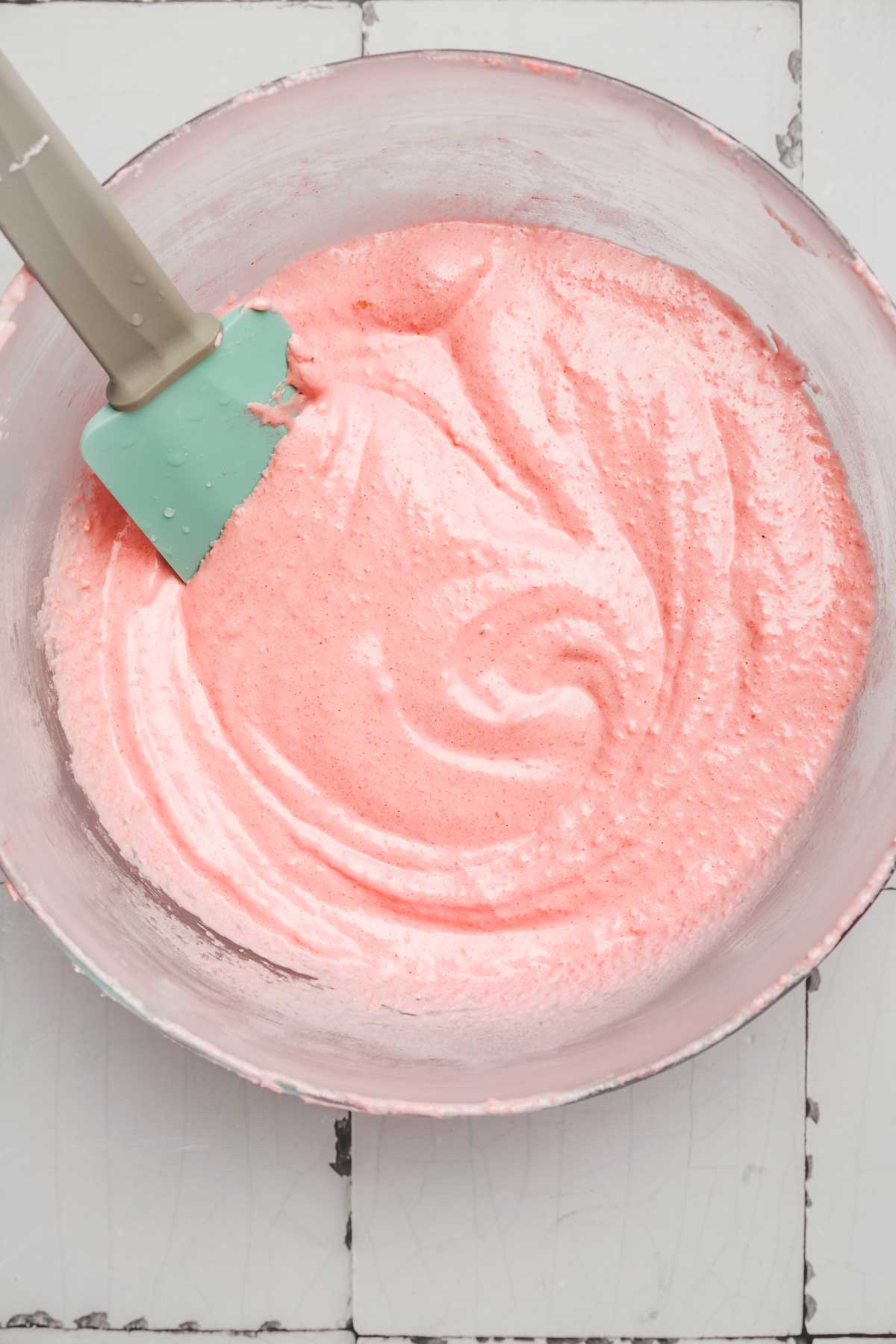 Bowl with pink macaron batter