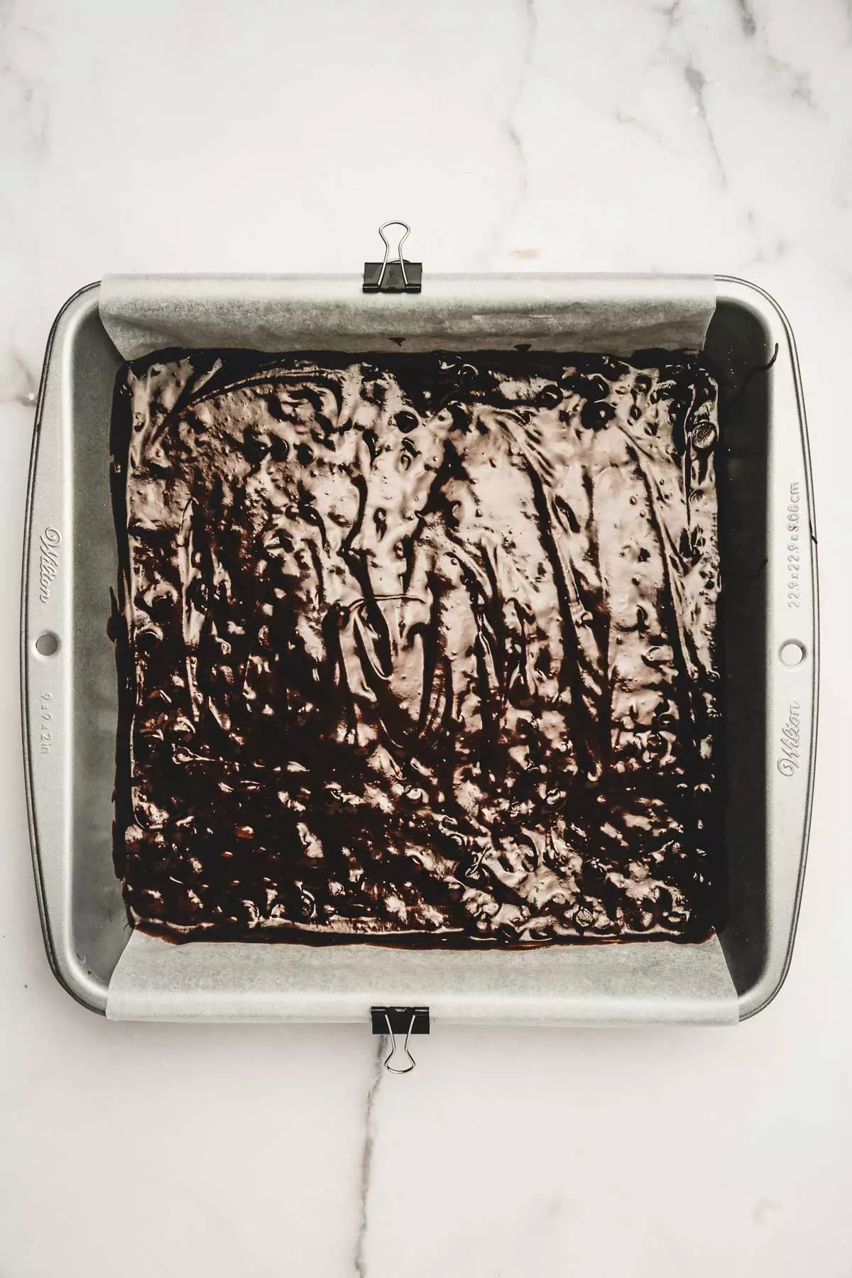 Brownie batter layer for brookies in baking pan
