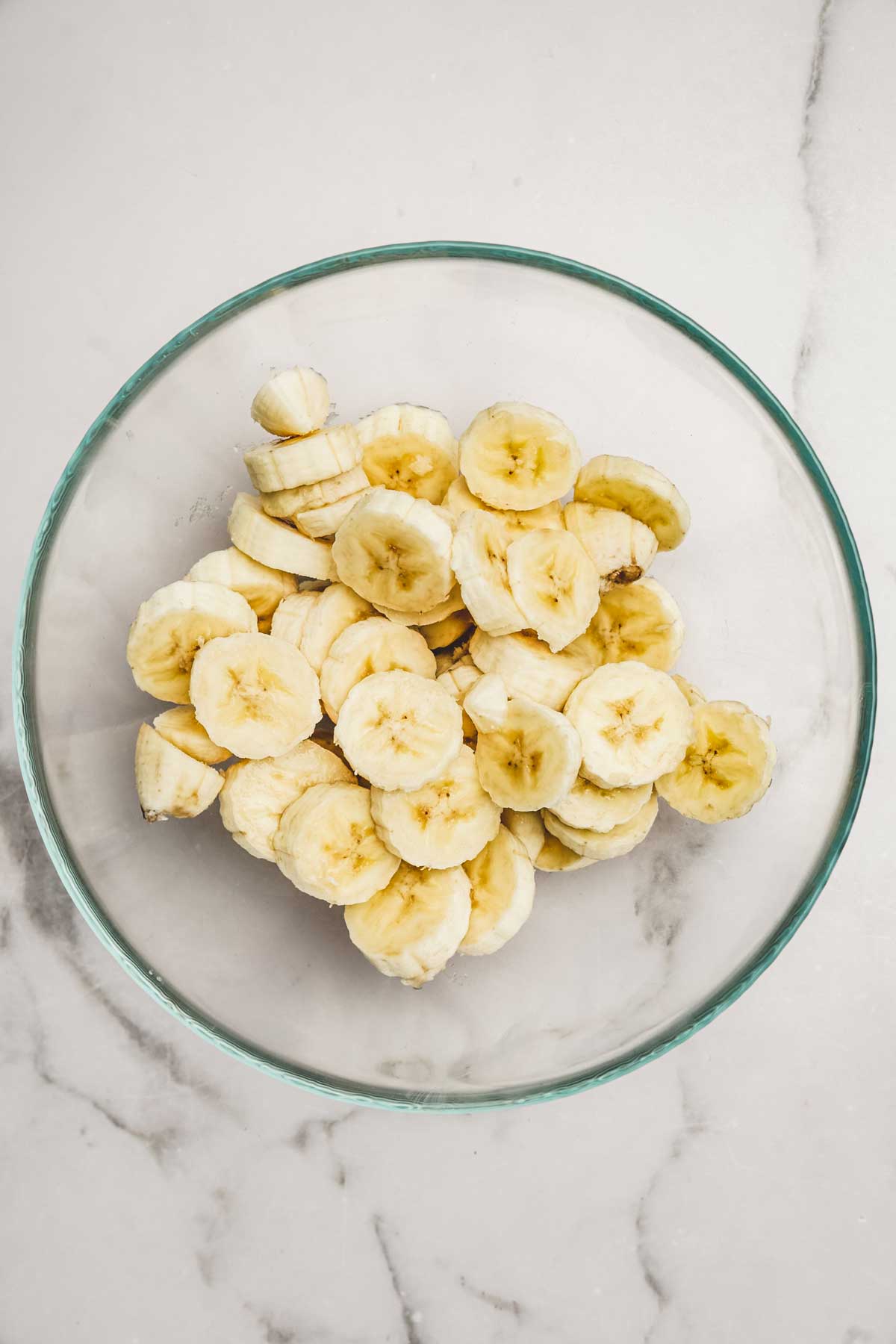 Bowl with pieces of bananas
