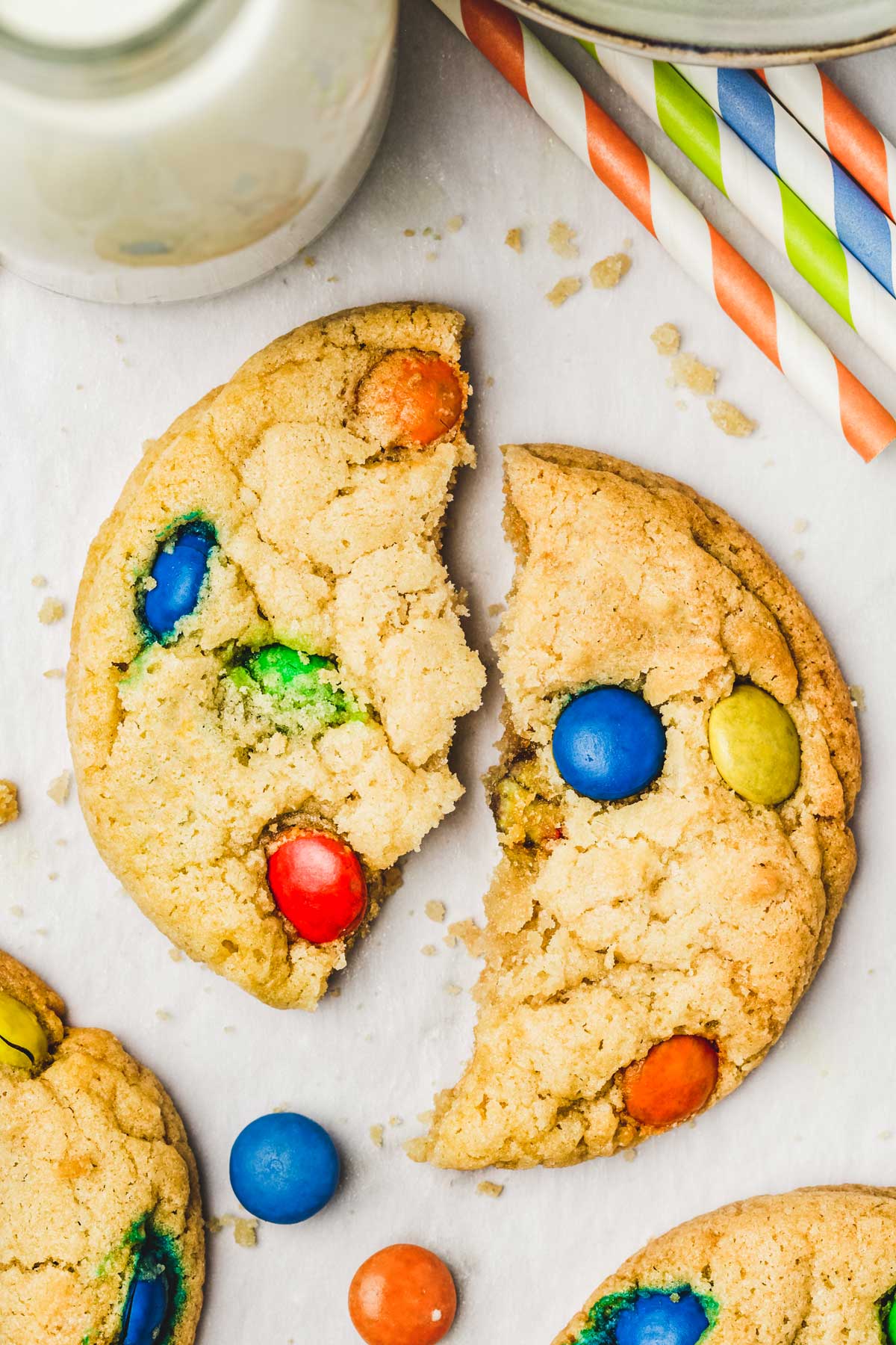 m&m's cookies cut in 2 on a table
