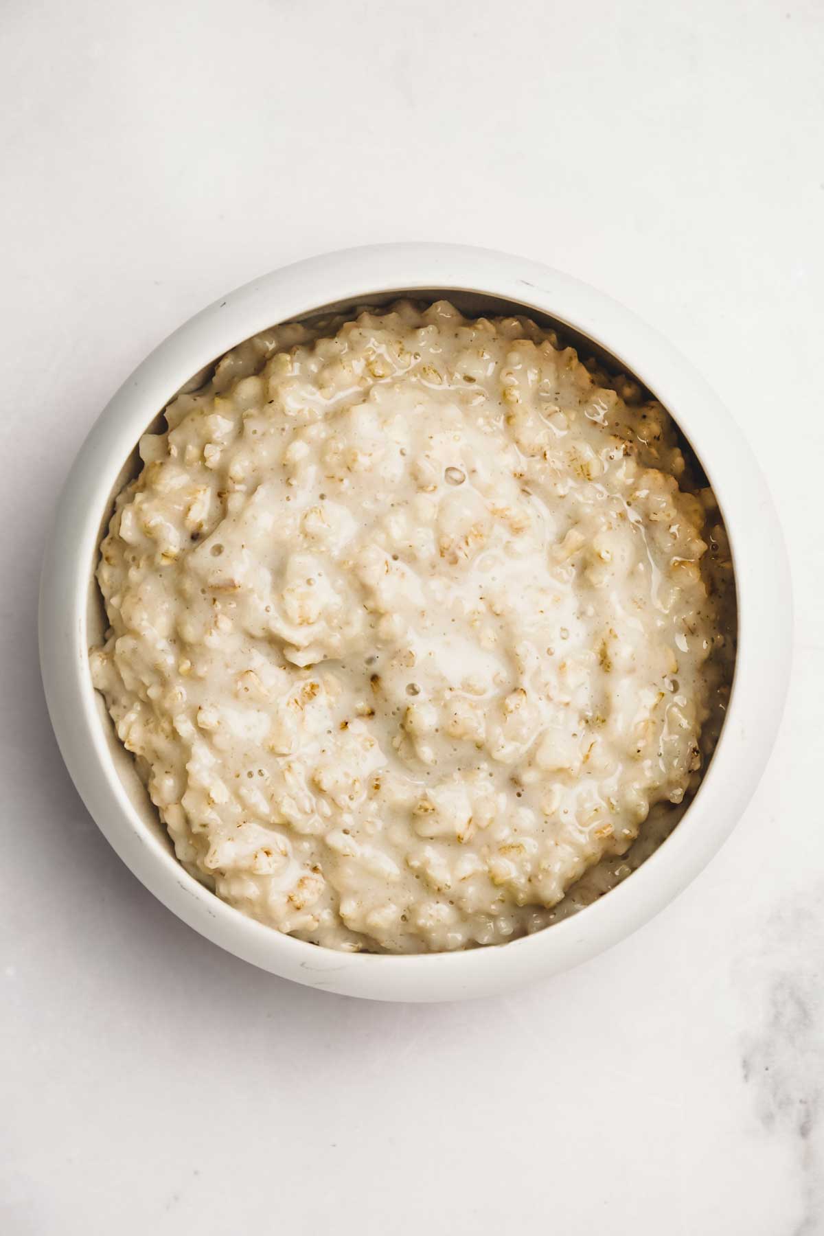 Bowl with oatmeal porridge