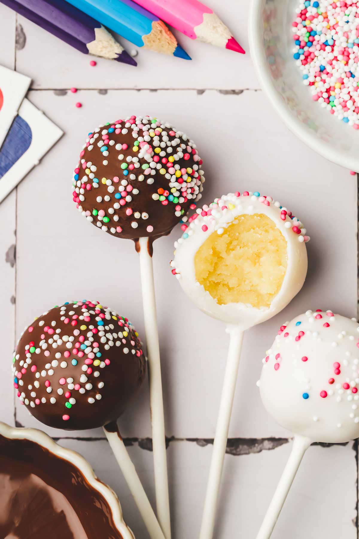 Cake pops on a table with sugar decorations