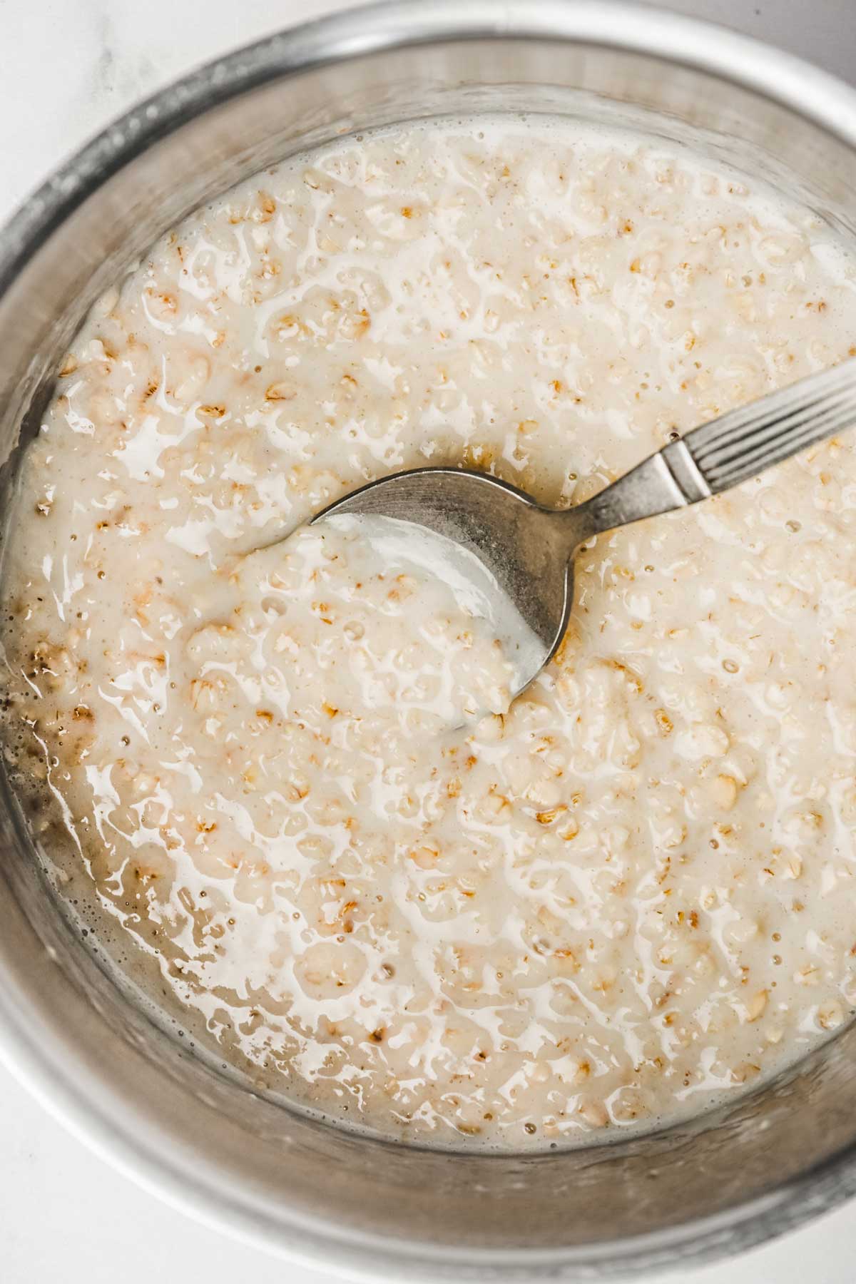 Saucepan with oatmeal porridge