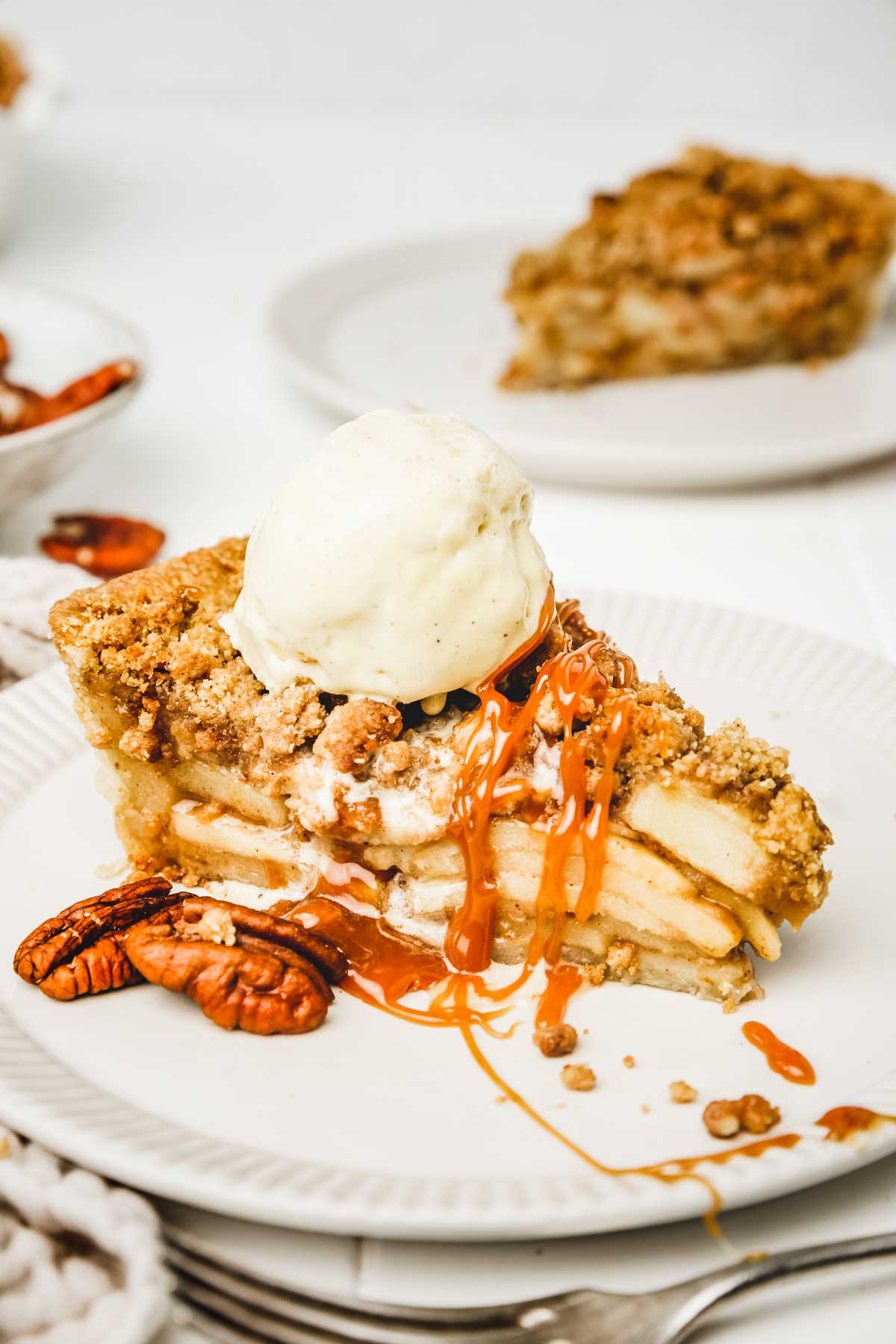 Sliced dutch apple pie on a plate
