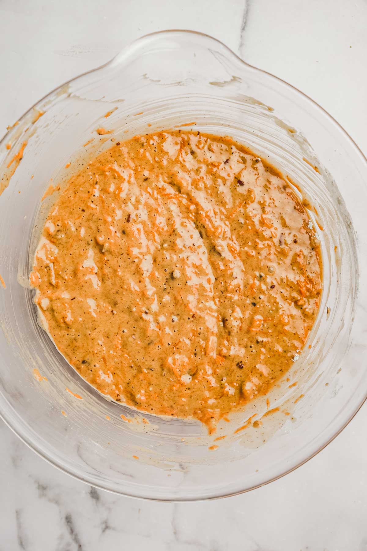 large bowl with carrot cake batter