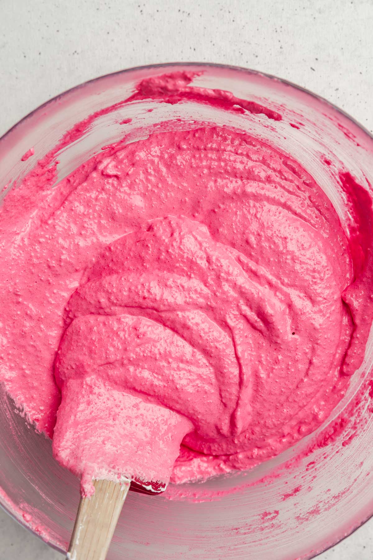 pink macaron batter ready for piping