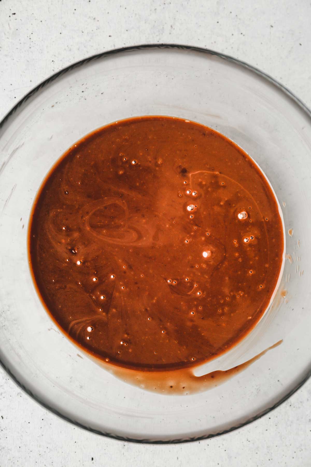 Bowl with liquide chocolate ganache