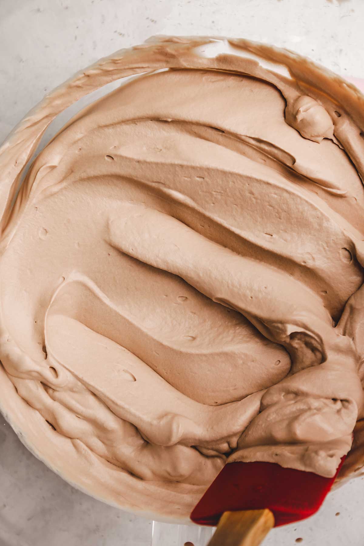 bowl with cooled and whipped milk chocolate ganache