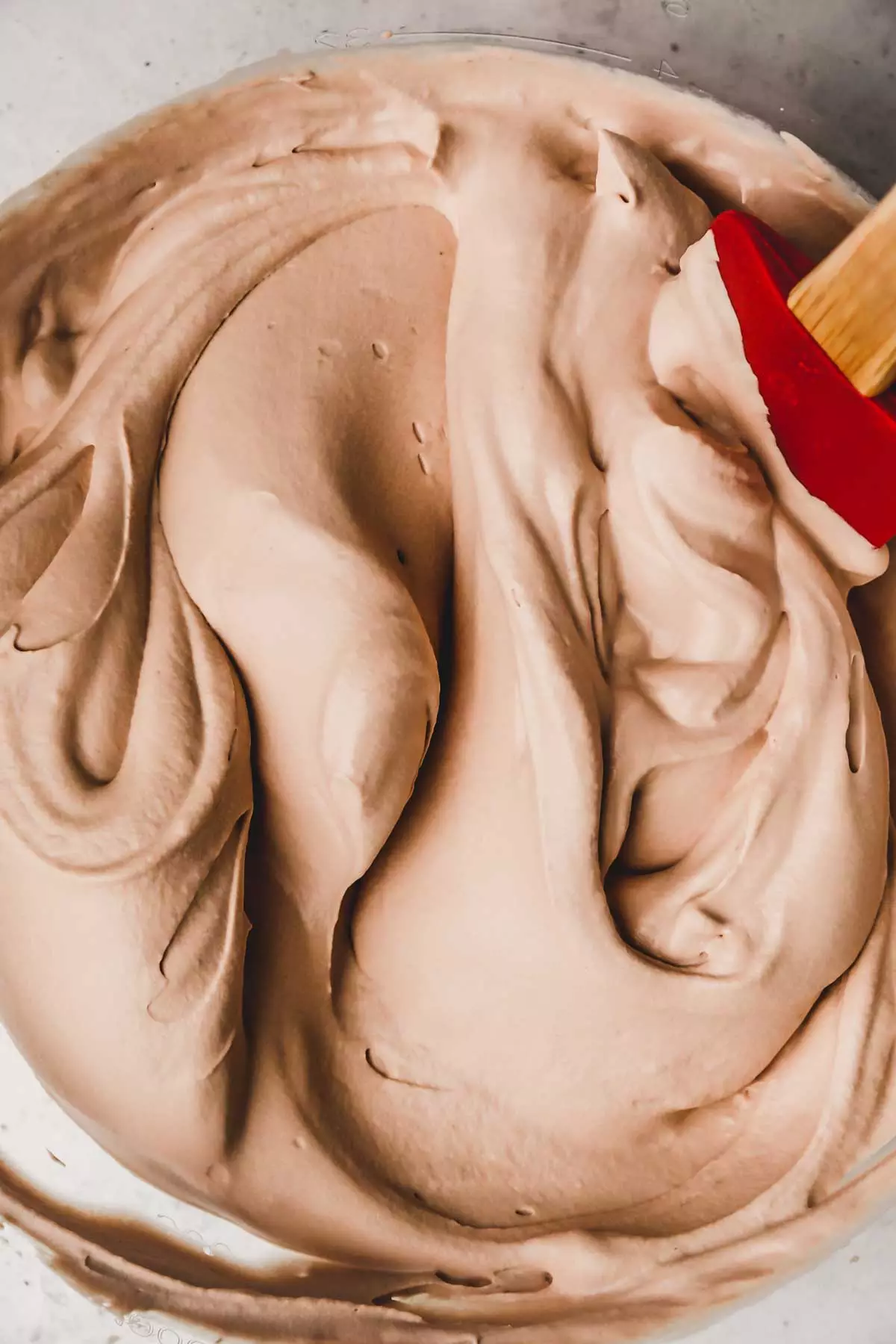 Bowl with chocolate ganache frosting