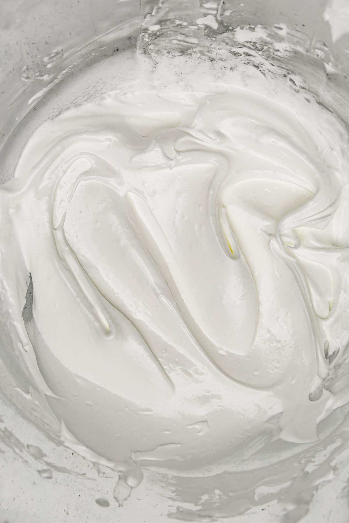 Italian meringue in a bowl ready for lemon tart topping