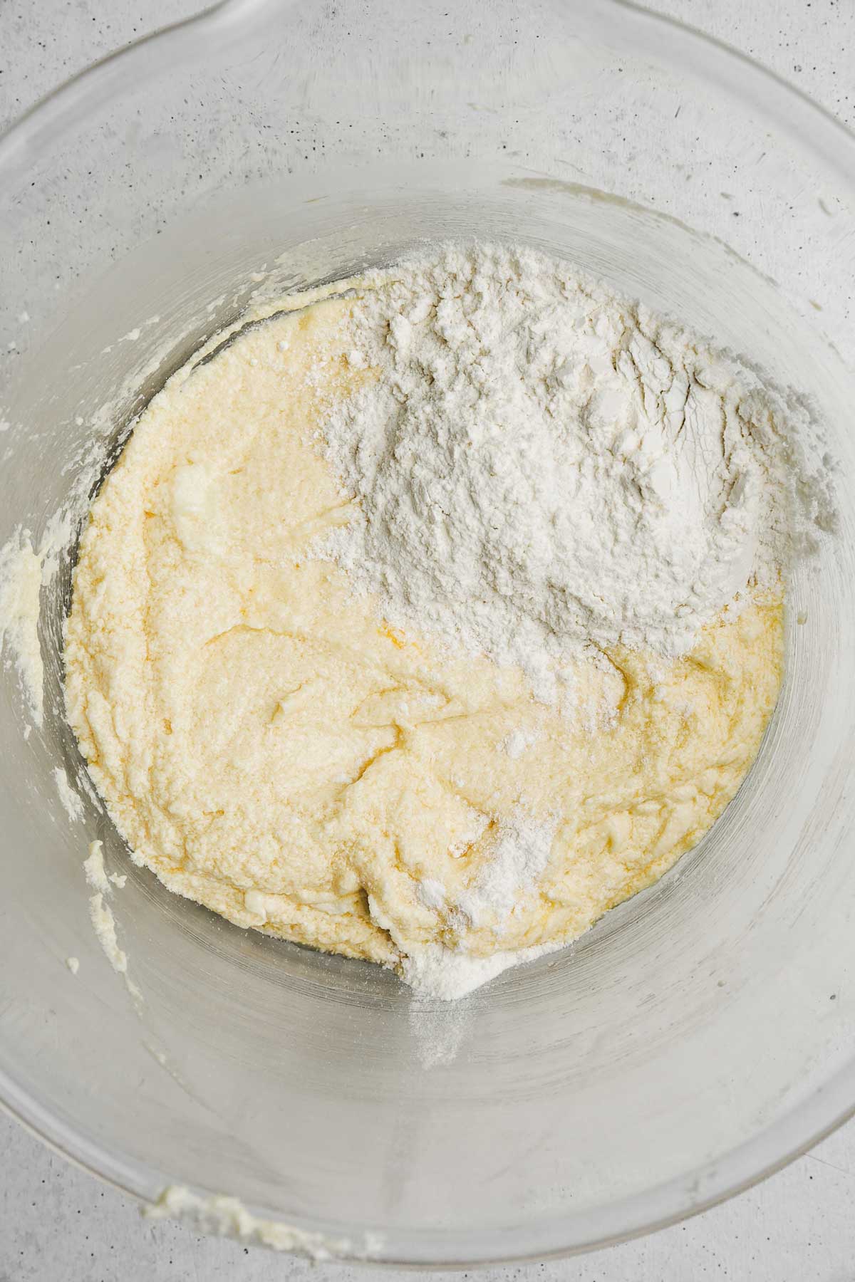 mixing bowl with flour mixture and batter