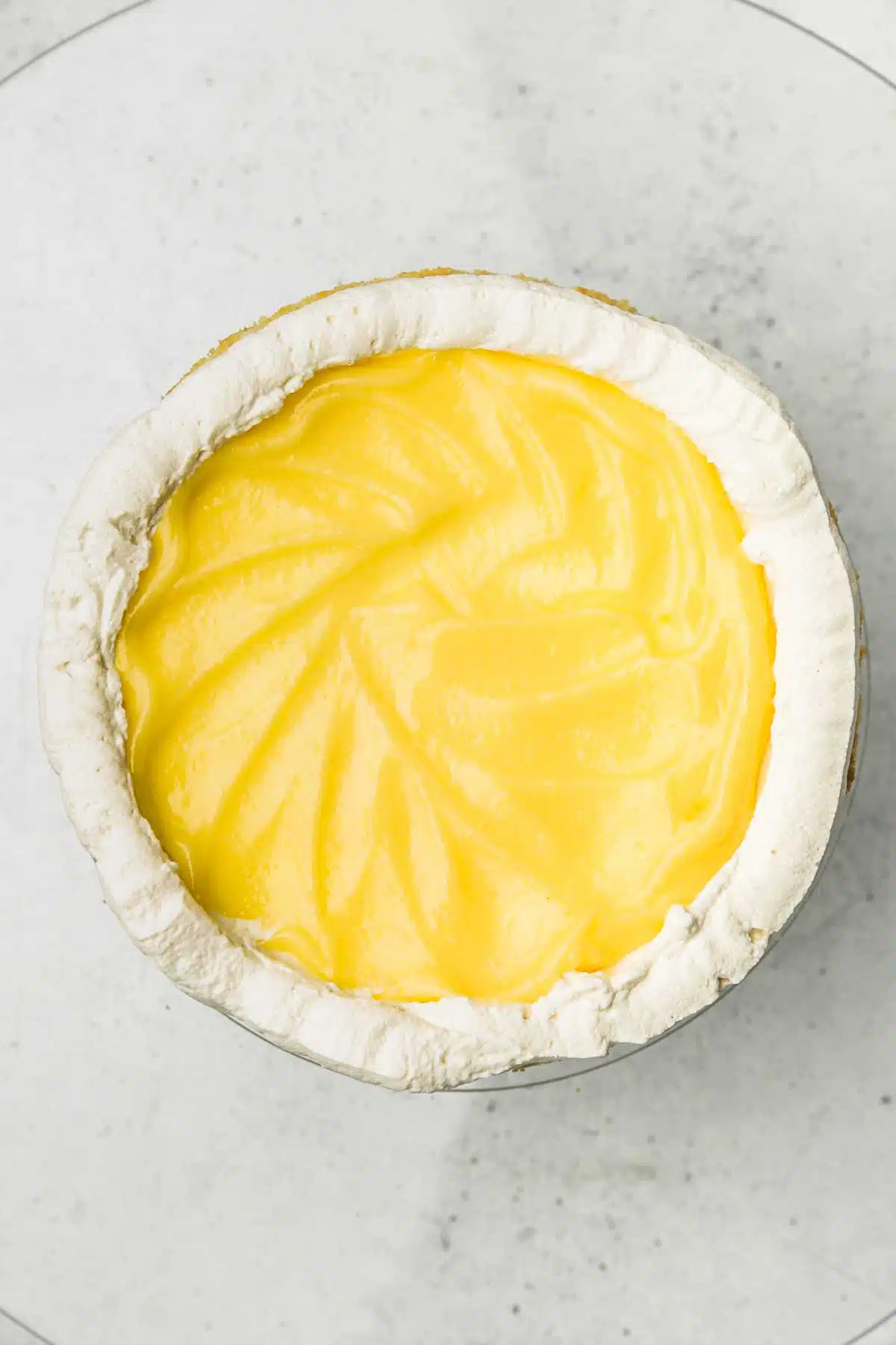 cake filled with whipped frosting and lemon curd