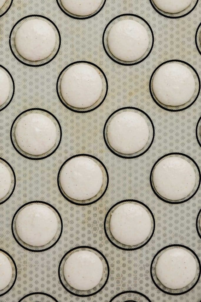 silicone mat with piped macarons