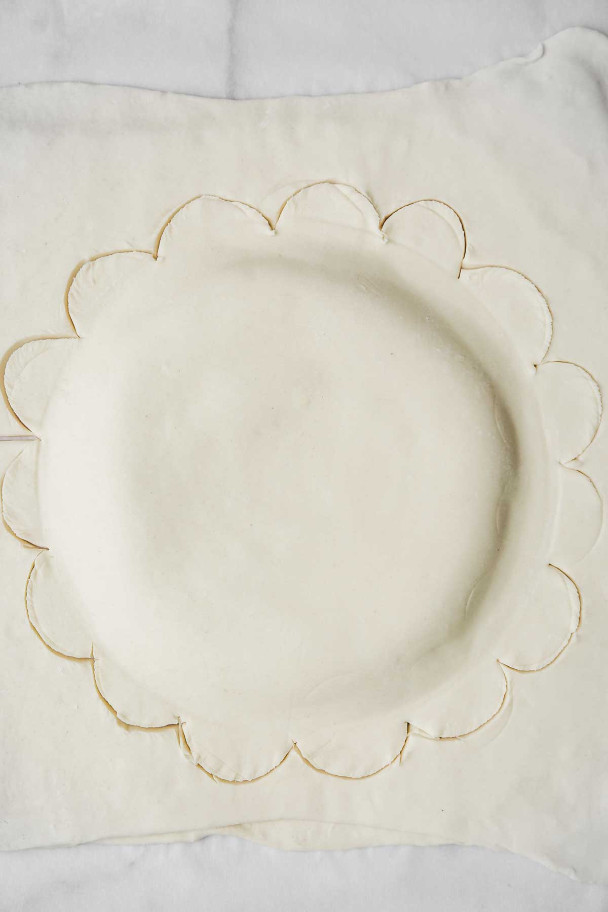Roll out puff pastry cut in a flower shape