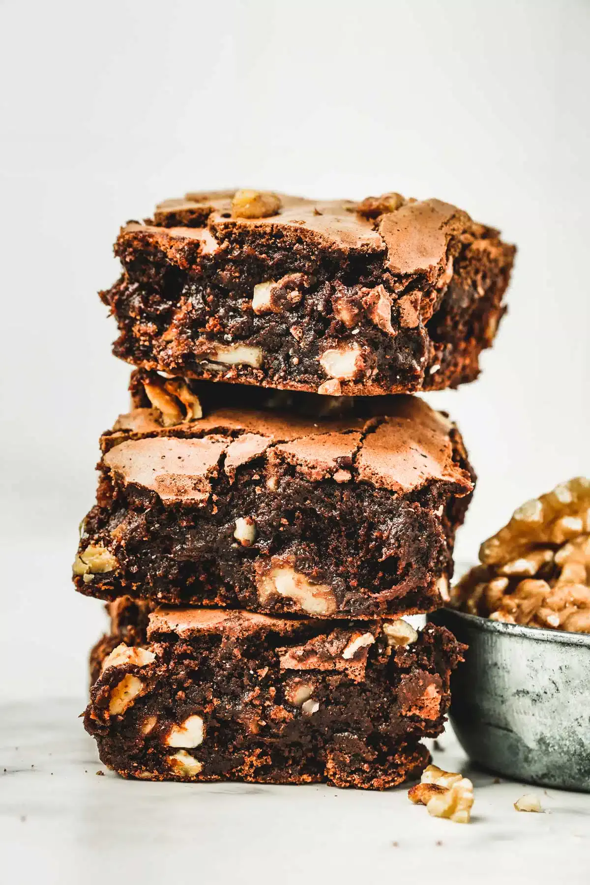 chocolate brownies with walnut on a table