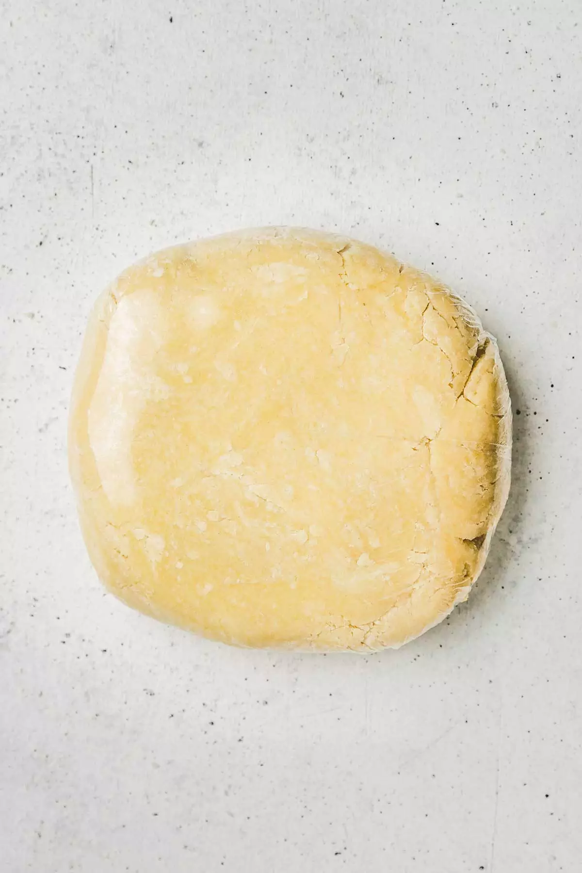 mixing bowl with covered pastry dough