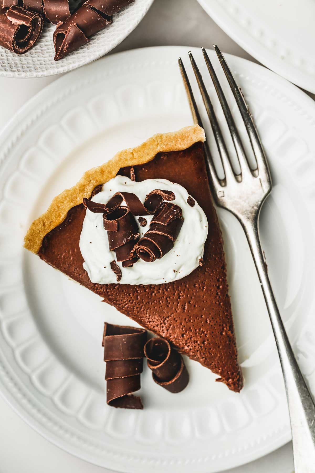 sliced french chocolate tart on a plate