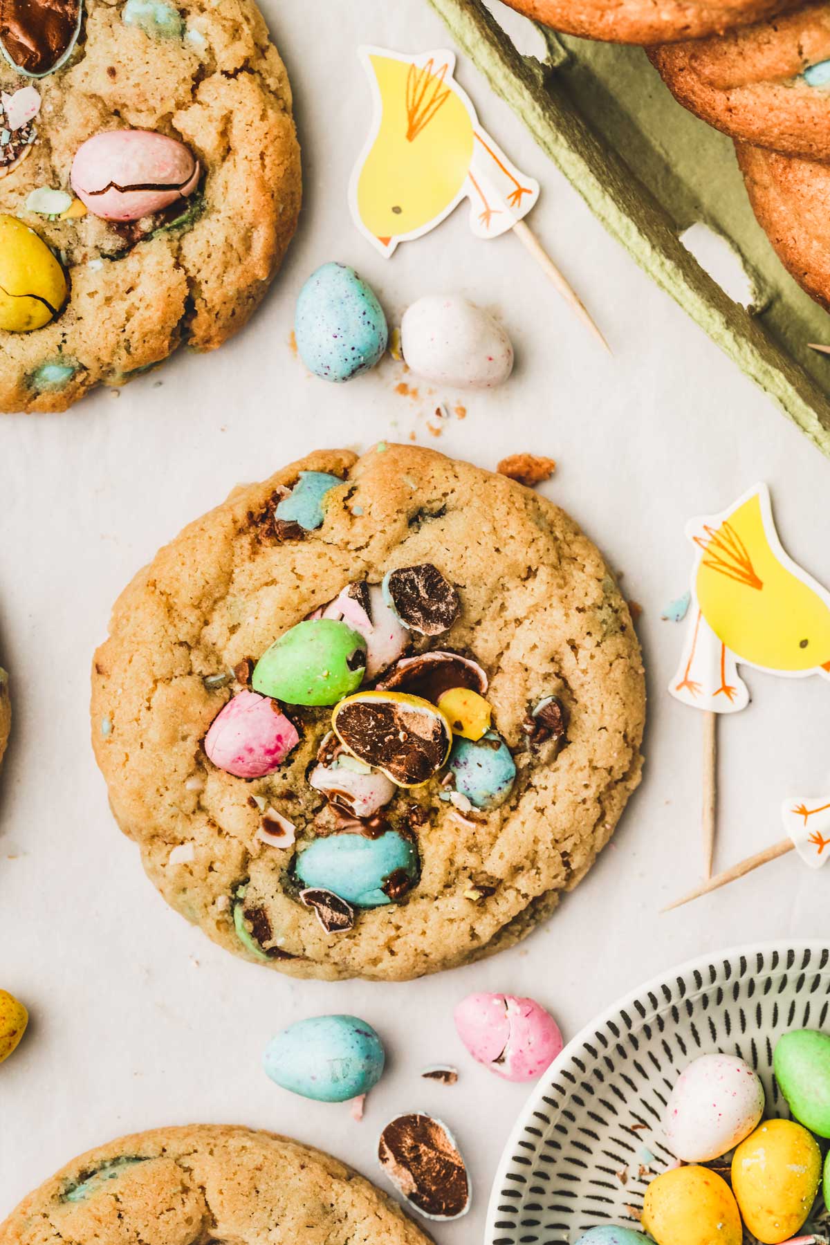 easter cookies on a table with easter decorations