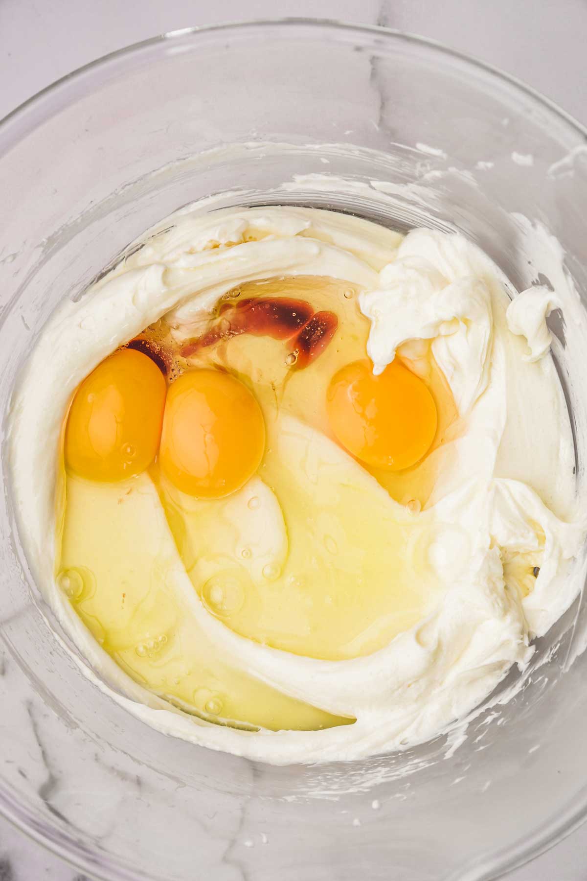 large bowl with cream cheese and eggs