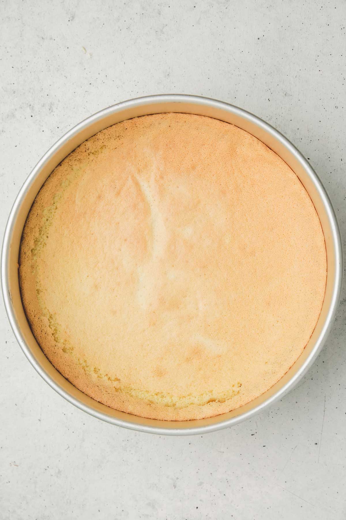 genoise cake on a cake pan