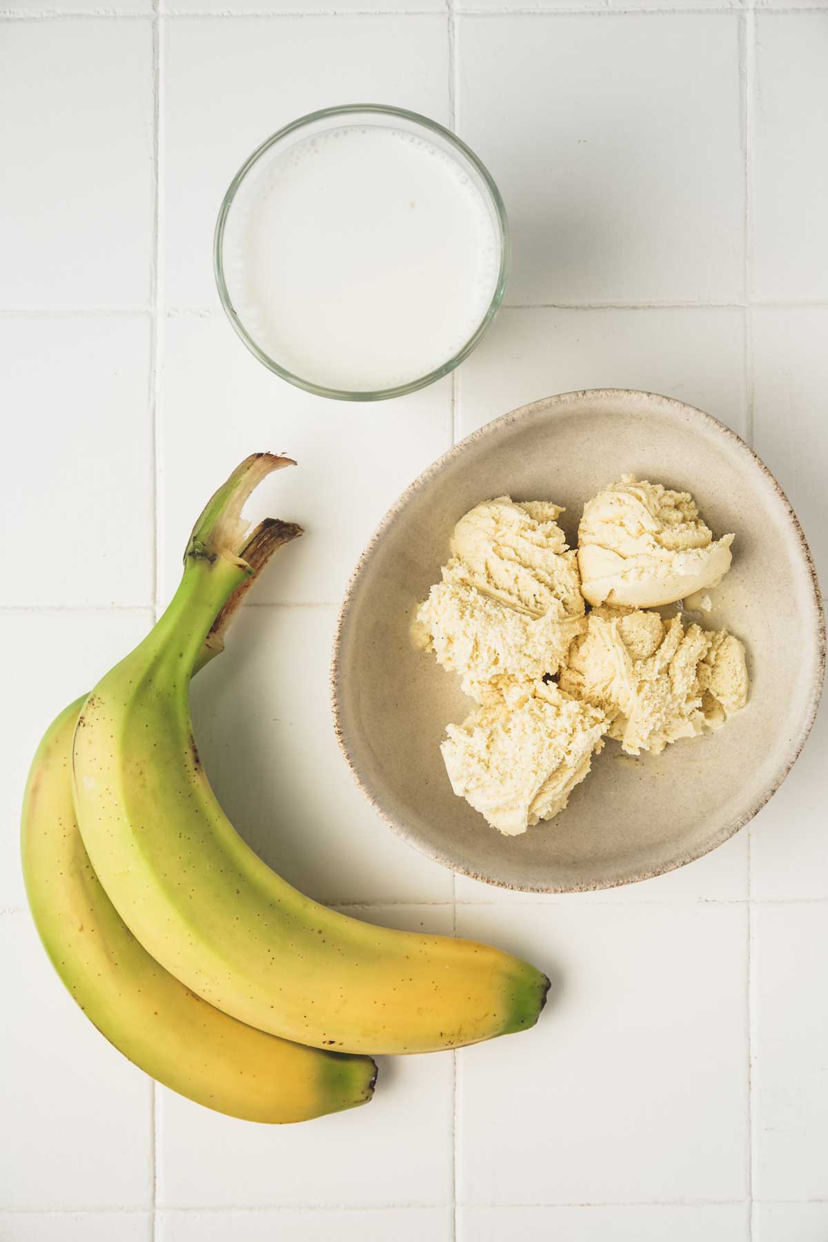 bowl with ingredients and bananas