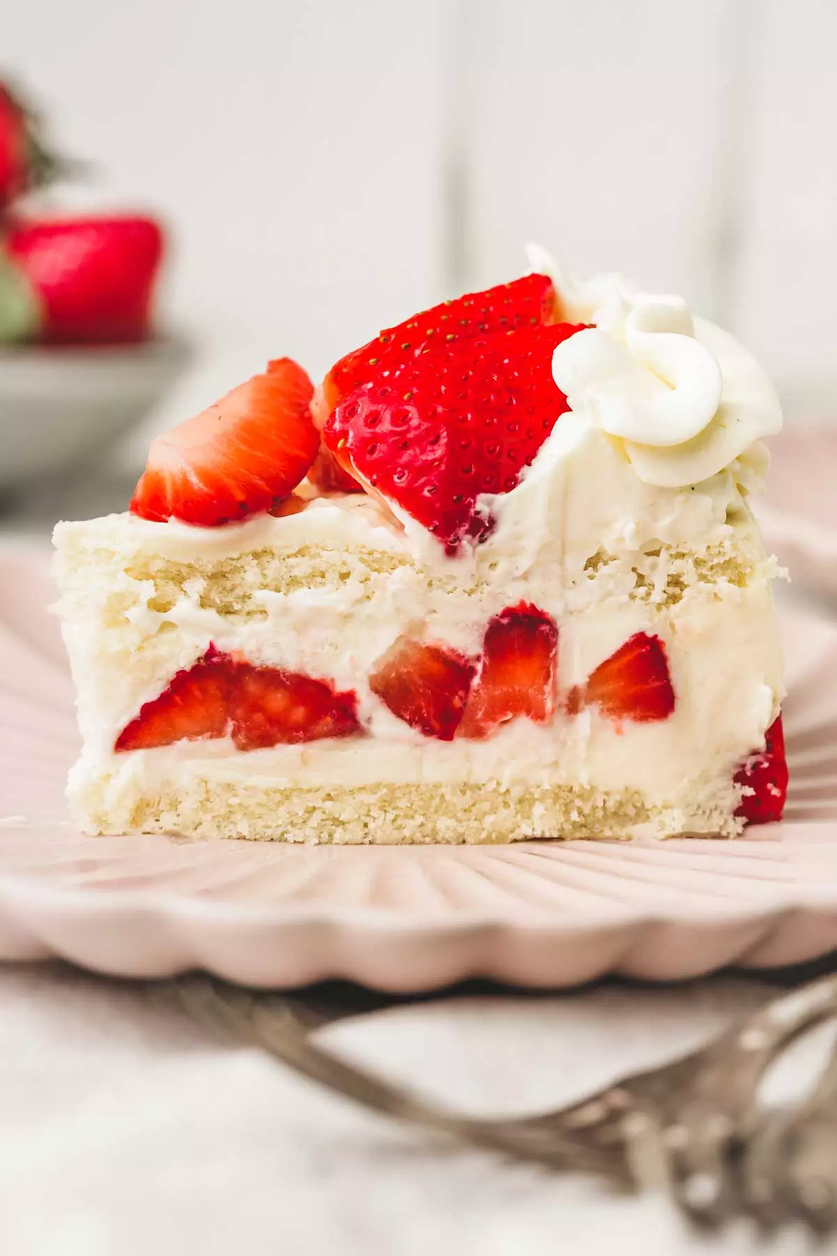 fraisier sliced on a dessert plate