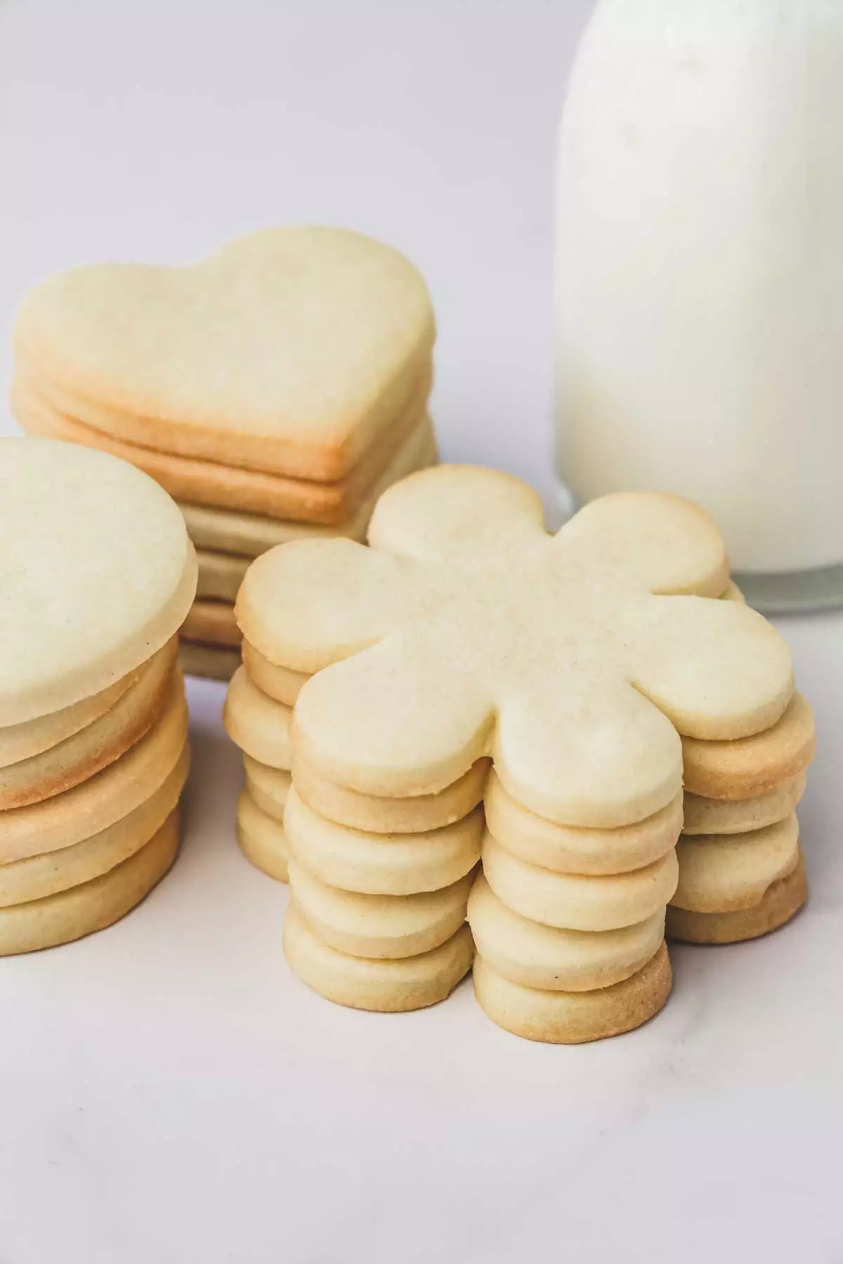 cut out sugar cookies baked on a table