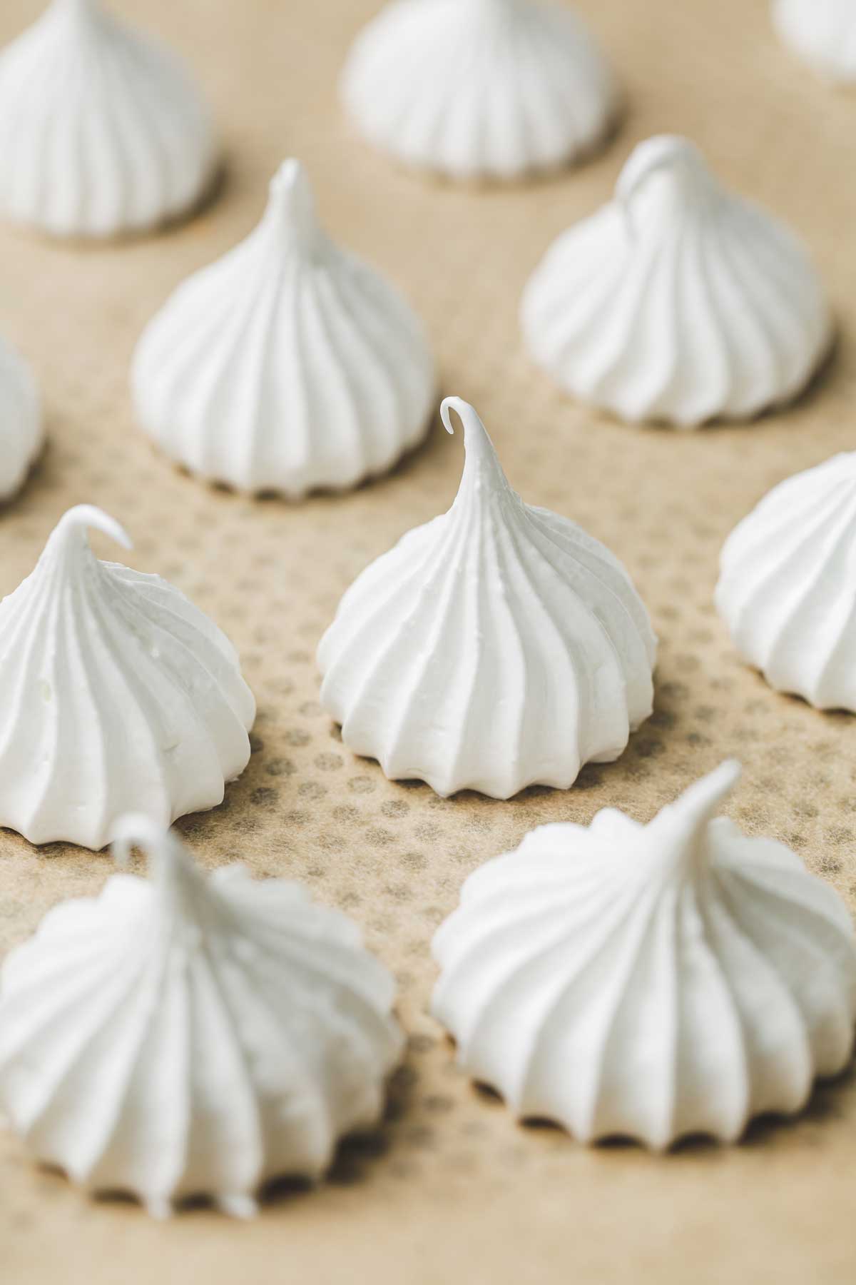 meringue cookies on a baking sheet