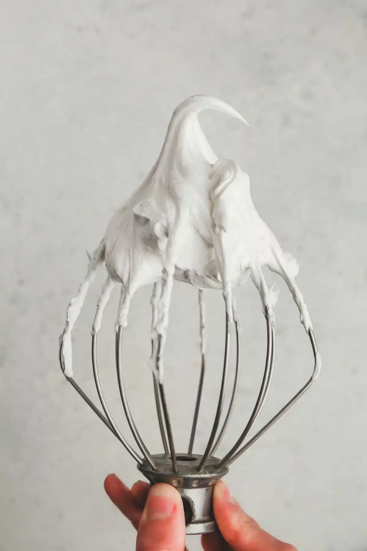 whisk with meringue mixture