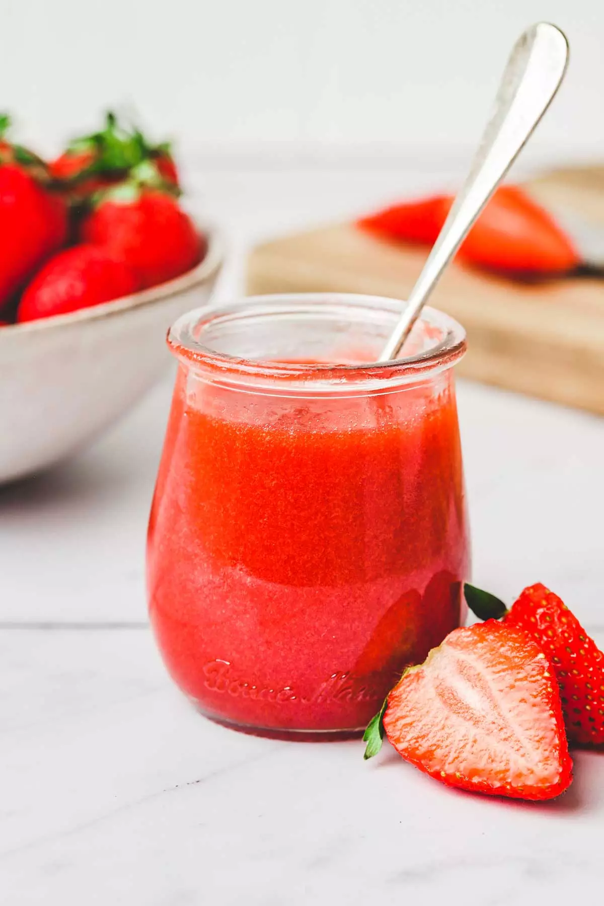 jar with strawberry coulis