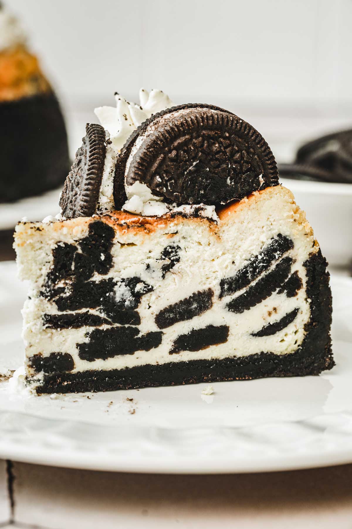slice of oreo cheesecake on a plate