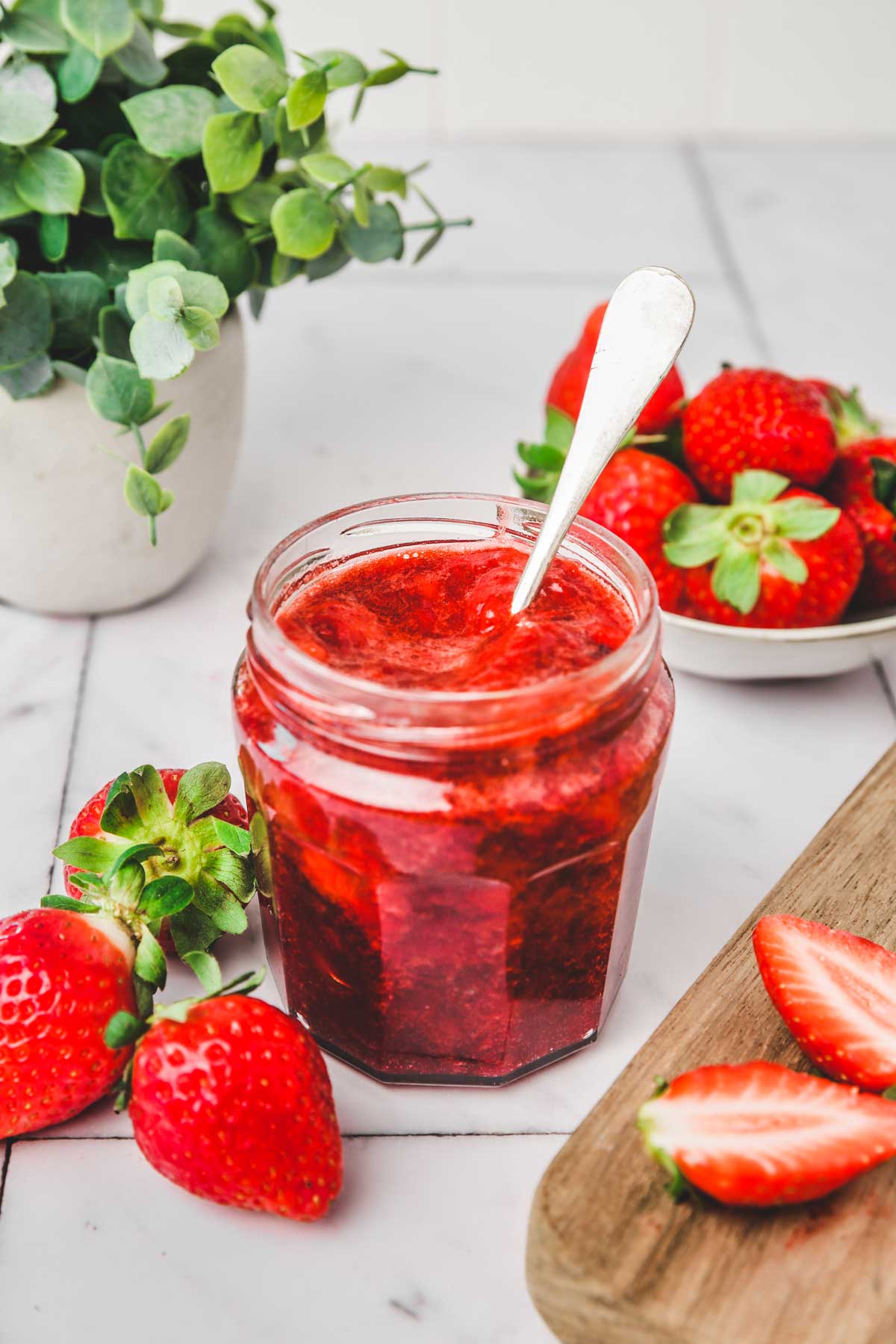 strawberry jam jar on a table