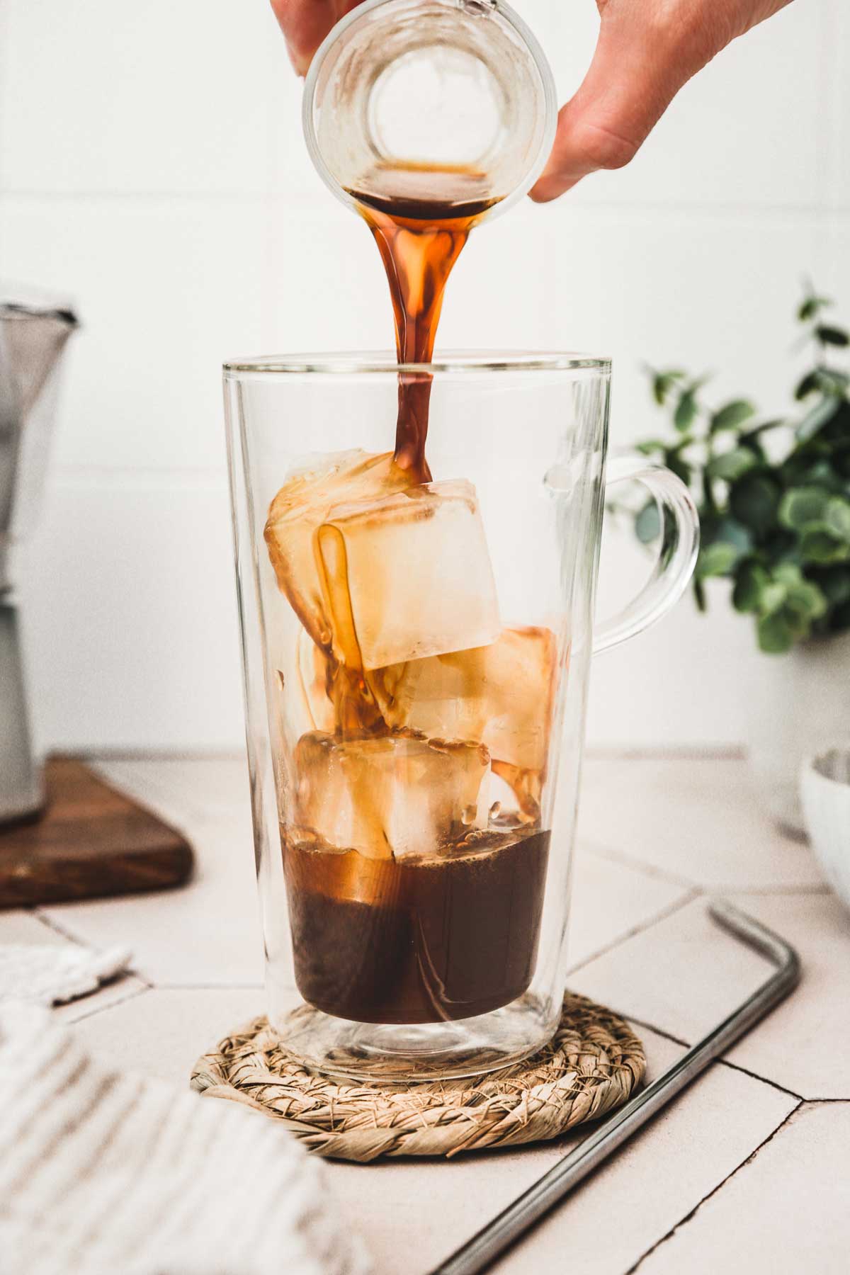 glass with ice cubes and coffee