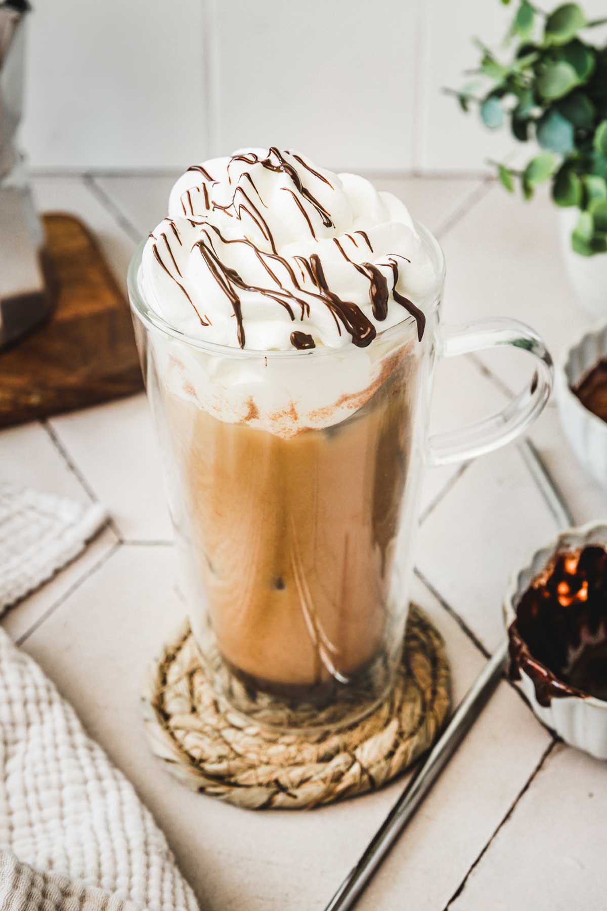 glass of ice mocha with whipped cream
