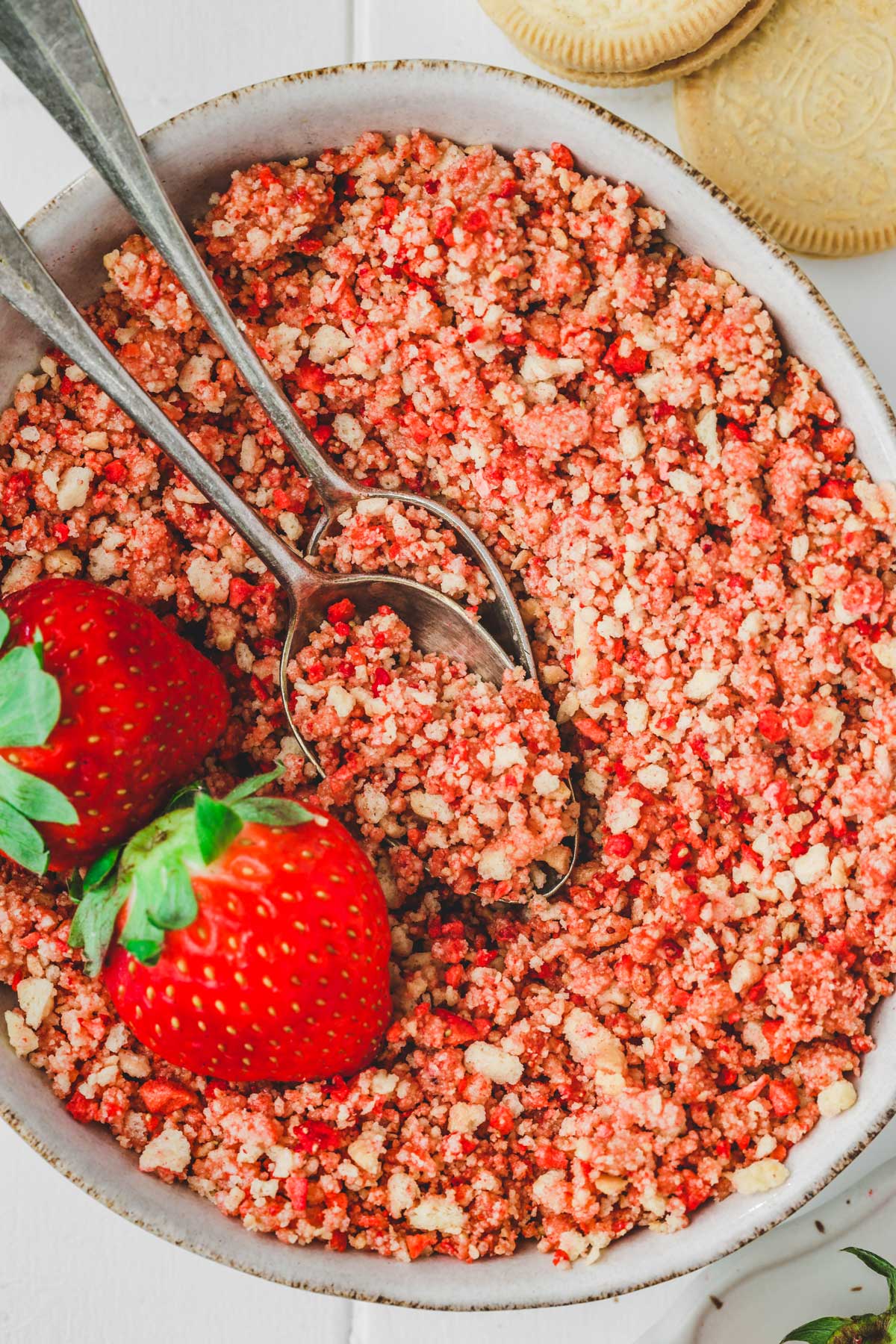 bowl with a strawberry flavored crumble